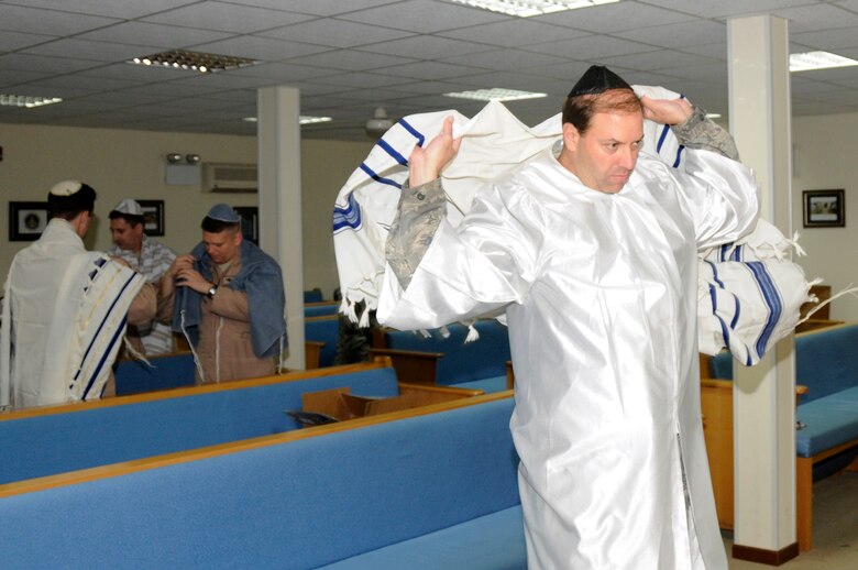 SOUTHWEST ASIA -- Capt. Gary Davidson, a Jewish Rabbi, prepares himself for worship here Oct. 8. Rabbi Davidson deployed for one month to the Area of Operations to perform religious services for deployed Jewish members. He will be dividing his time spent away from the U.S. Air Force Academy at three different locations during some of the most important Jewish holidays of the year. (U.S. Air Force photo/Tech. Sgt. Christopher A. Campbell)(released)