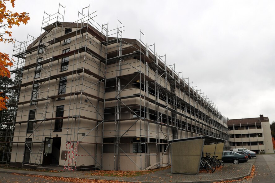 Scaffolding was put in place for a new exterior paint job in 2008 at Dorm 2414 on Ramstein Air Base, Germany, to help the dorms look better for the Airmen and the surrounding area. Quality of Life projects are just one of the ways the base is helping to provide clean, safe and secure dormitories to Airmen. (U.S. Air Force photo by Airman 1st Class Caleb Pierce)