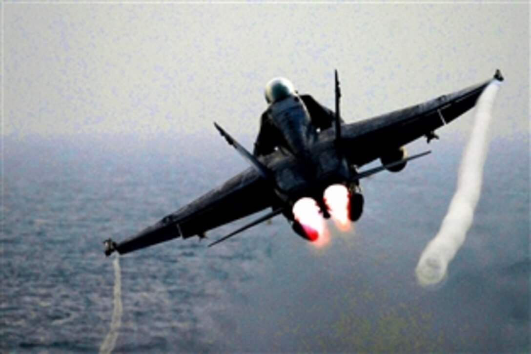 An F/A-18C Hornet assigned to Strike Fighter Squadron 25 launches from the Nimitz-class aircraft carrier USS Ronald Reagan in the Gulf of Oman, Oct. 8, 2008. The F/A-18C Hornet is an all-weather, attack aircraft that can also be used as a fighter. Ronald Reagan is deployed to the U.S. 5th Fleet area of responsibility.