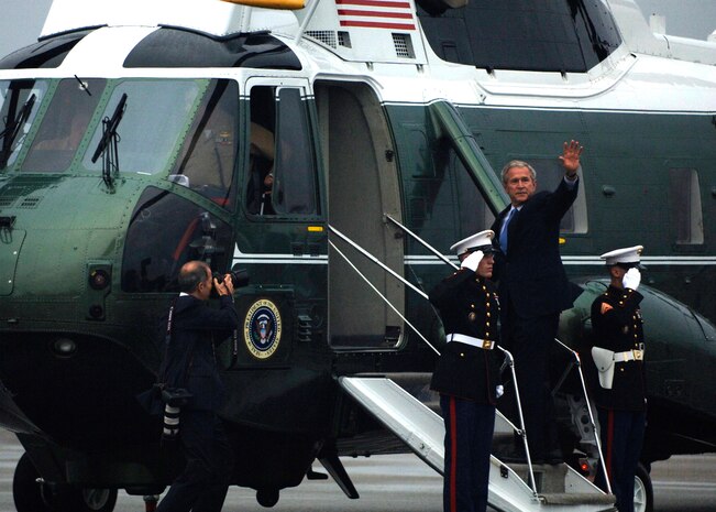 President George Bush waves farewell to members of Charleston Air Force Base, S.C., as he boards Marine One on the flightline, Oct. 10. President Bush met with more than 250 Team Charleston members en route to an event at Kiawah Island, S.C. (U.S. Air Force photo/Airman 1st Class Timothy Taylor)
