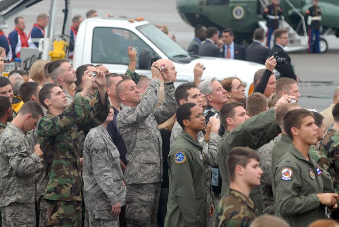 Members of Team Charleston take photos of Air Force One as it taxis on the Charleston Air Force Base, S.C., flightline Oct. 10. President George Bush met with more than 250 Team Charleston members en route to an event at Kiawah Island, S.C. (U.S. Air Force photo/Staff Sgt. Sam Hymas)