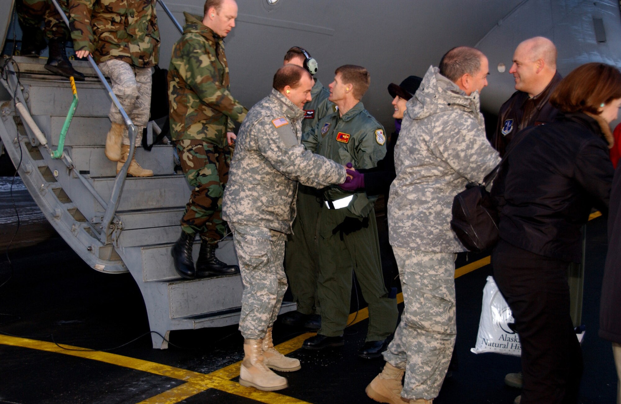 The 354th Fighter Wing commander, Brig. Gen. Mark Graper greets military officers from foreign countries Oct. 9, 2008 at Eielson Air Force Base, Alaska. The 354th Fighter Wing and 168th Air Refueling Wing leadership hosted the Defense Attache Program which involves nearly 80 high ranking military officers representing many different countries from around the world. This program gives foreign officers the chance to see what the Air Force accomplishes in an Arctic environment. (U.S. Air Force photo by Airman Laura Max)