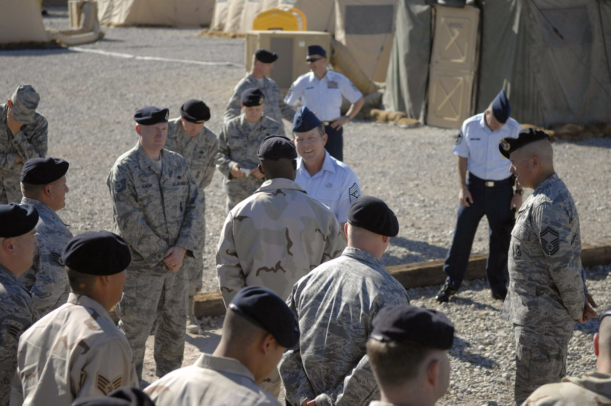Chief Master Sgt. of the Air Force Rodney J. McKinley visits with Airmen assigned to the 99th Ground Combat Training Squadron Oct. 6 at Creech Air Force Base, Nev. Squadron Airmen provide advanced ground combat weapons and tactics instruction that enhance the combat capabilities of Air Force ground forces. (U.S. Air Force photo/Airman 1st Class Stephanie Rubi) 
