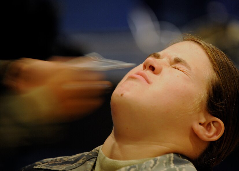 MOODY AIR FORCE BASE, Ga. -- An Airman of the 23rd Wing receives intranasal flu mist here Oct. 7. The 23rd Medical Group administered the flu mist to active duty personnel in the base theater for two days before the start of "flu season." (U.S. Air Force photo by Senior Airman Brittany Barker)