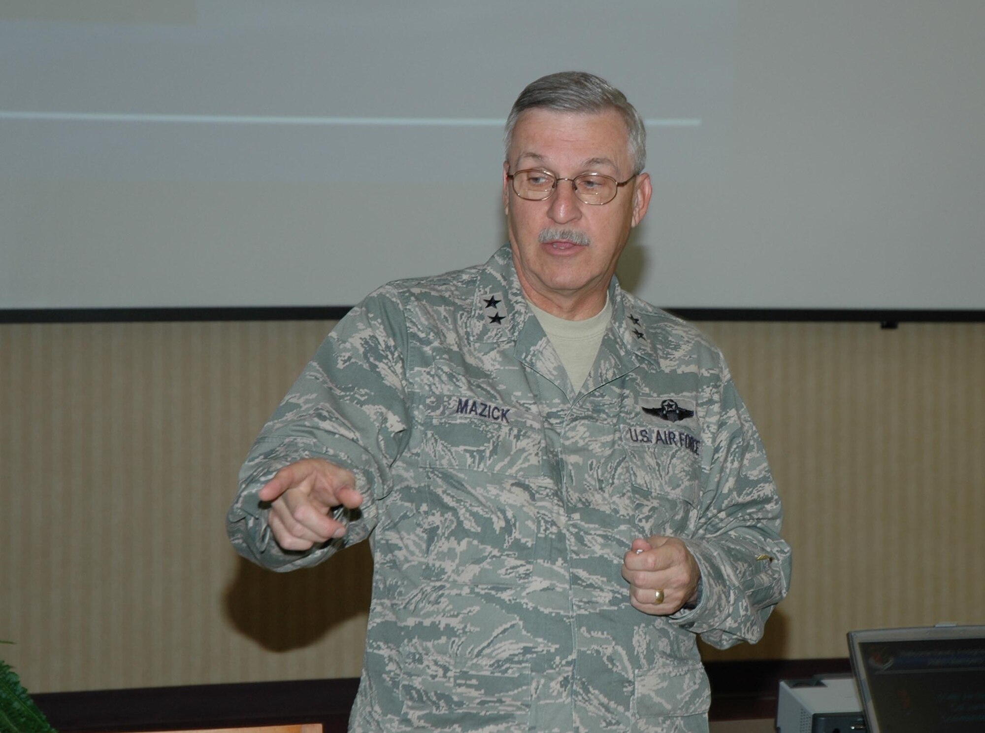 MCGUIRE AIR FORCE BASE, N.J. - Maj. Gen. Martin M. Mazick, commander, 22nd Air Force, Dobbins Reserve Air Base, Ga., answers questions and welcomes Reservists to the wing at the newcomers briefing here. General Mazick met with members and toured various units throughout the wing on his visit during the October unit training assembly. (U.S.Air Force photo/Staff Sgt. Monica Dalberg)