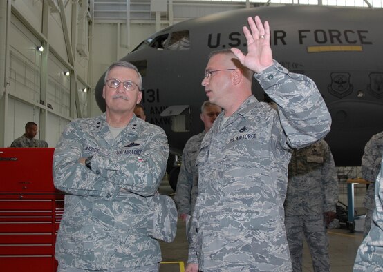 MCGUIRE AIR FORCE BASE, NJ - Maj. Gen. Martin M. Mazick, commander, 22nd Air Force, Dobbins Reserve Air Base, Ga., looks on as Senior Master Sgt. Robert Henderson, 514th Air Mobility Wing Maintenance Squadron, Maintenance Flight Chief, explains the Home Check Station process.  The HCS process is an in-depth scheduled inspection of aircraft systems and is an Air Mobility Command benchmark for which the 305th Air Mobility Wing and 514th MXS won the AMC Chief of Staff Excellence award this year. General Mazick met with members and toured various units throughout the wing during his October visit. (U.S.Air Force photo/Staff Sgt. Monica Dalberg)