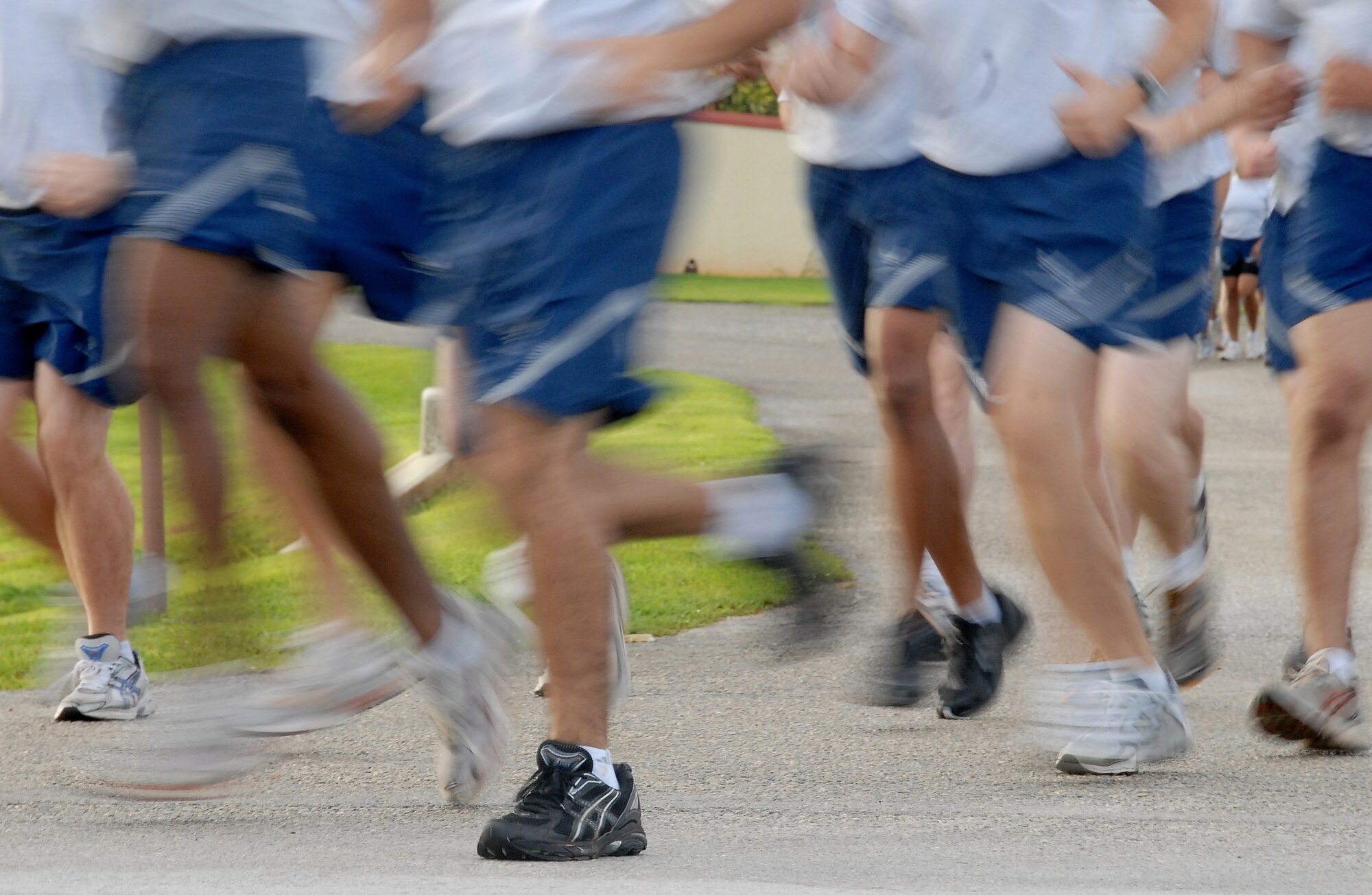 ANDERSEN AIR FORCE BASE, Guam - Team Andersen members hit the ground running during an early-morning wing run here Oct. 10. The 36th Wing participates in a monthly 1.5 mile run to enhance esprit de corps, teamwork and readiness.  (U.S. Air Force photo by Master Sgt. Lisa M. Zunzanyika)
