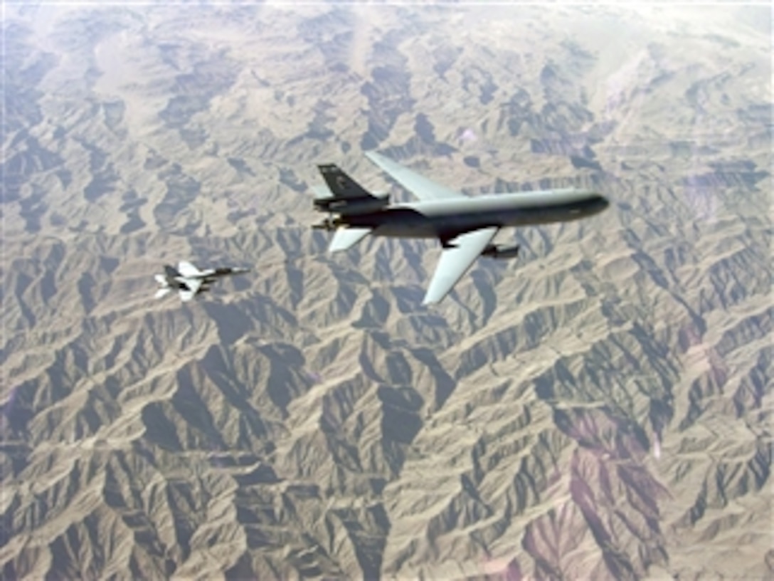 An F/A-18C Hornet aircraft from Strike Fighter Squadron 113 refuels from a U.S. Air Force KC-10 Stratotanker aircraft over southeastern Afghanistan during a mission supporting international security forces in the Helmand province on Oct. 6, 2008.  The squadron is embarked aboard the aircraft carrier USS Ronald Reagan (CVN 76) to provide support to coalition ground forces in Afghanistan.  