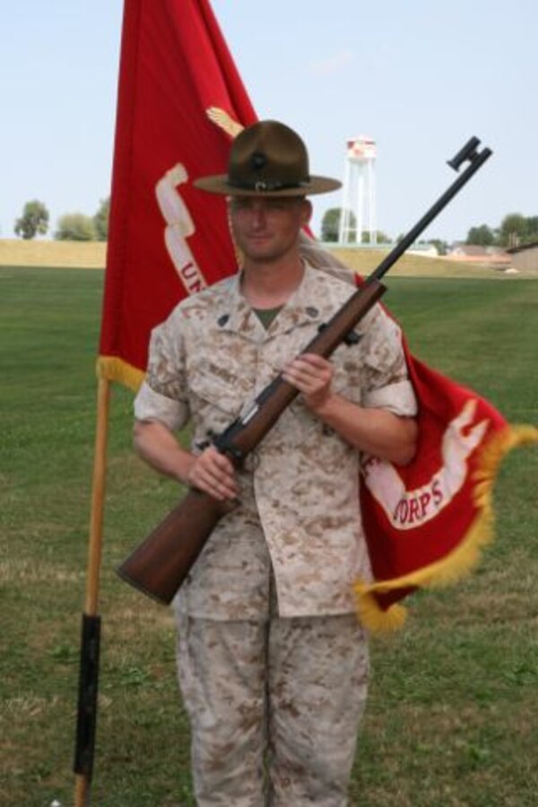 Gunnery Sgt. Justin Skaret, member of the Marine Forces Reserve Rifle Team, poses with his Secretary of the Navy Trophy Rifle, awarded for setting a new National Service Record in the Palma course of fire. Skaret was the only Marine on the 2007 United States Palma Team.