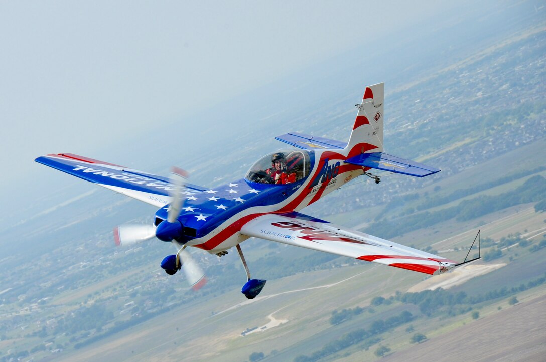 FORT WORTH, Texas - U.S. Air force Pilot Major John Klatt flies the Staudacher S-300D Stunt plane upside down for the Air National Guard during the Alliance Air Show  Oct. 11, 2008 as part of their 18 air-shows road tour. (USAF photo by Senior Master Sgt. Elizabeth Gilbert)