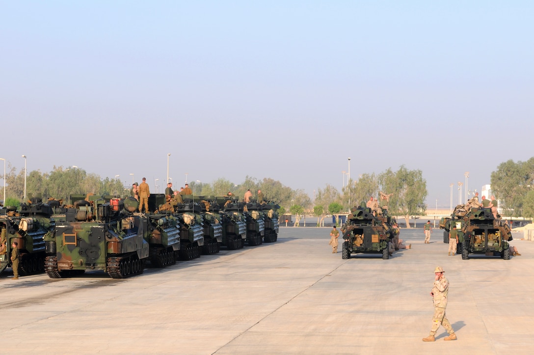 26th Marine Expeditionary Unit offloaded Amphibious Assault Vehicles and Light Armored Vehicles here Oct. 12 in preparation for an exercise in Kuwait.