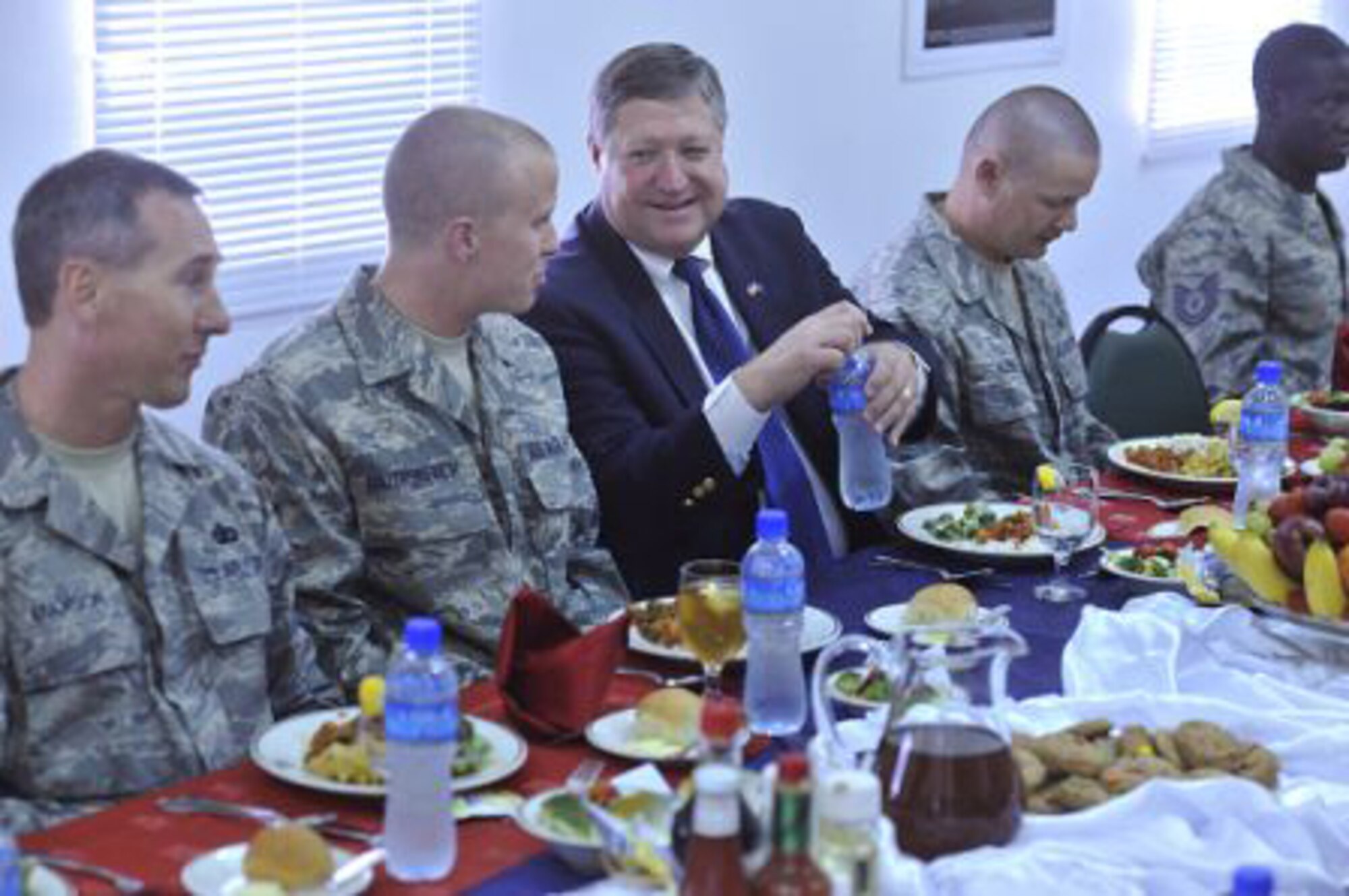 Secretary of the Air Force Michael Donley shares lunch Oct. 11 with Airmen and recognizes award winners from the Combined Air and Space Operations Center located in Southwest Asia. The CAOC commands and controls the broad spectrum of what airpower brings to the fight: Global Vigilance, Global Reach, and Global Power. (U.S. Air Force photo/Staff Sgt. Aaron Allmon)