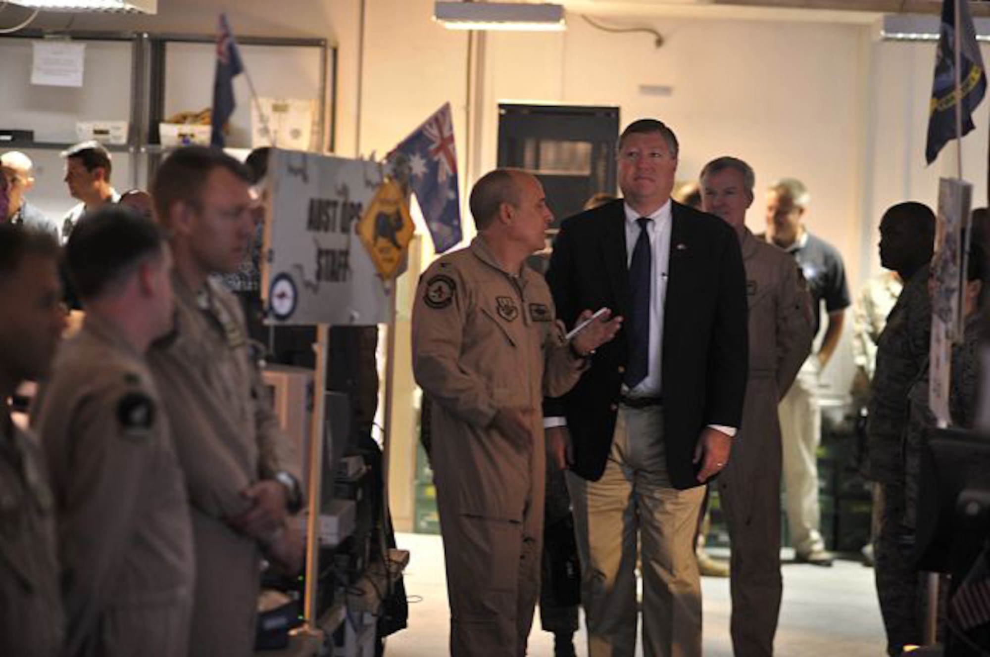 Col. Doug Anderson, director of combat operations for the Combined Air and Space Operations Center, explains to Secretary of the Air Force Michael Donley Oct. 11 how airpower is delivered on a daily basis in Iraq, Afghanistan and the Horn of Africa. (U.S. Air Force photo/Staff Sgt. Aaron Allmon)