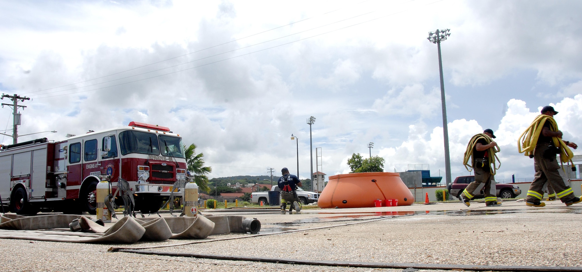 ANDERSEN AIR FORCE BASE, Guam - Local and military firefighters from across Guam participated in the 2008 Guam Fire Muster Competition Oct. 12 at Paseo Park in Chamorro Village. Six teams competed in this year's competition including U.S. Air Force Team Andersen, Team U.S. Navy, Seventeenth and Those Two Guys Guam Fire Department (GFD), Gi Yena (GFD), God's Son’s. (GFD) and Mutual Aid (GFD). Andersen Fire and Emergency Services Firemen took home first place overall in the competition. (U.S. Air Force photo by Airman 1st Class Nichelle Griffiths)