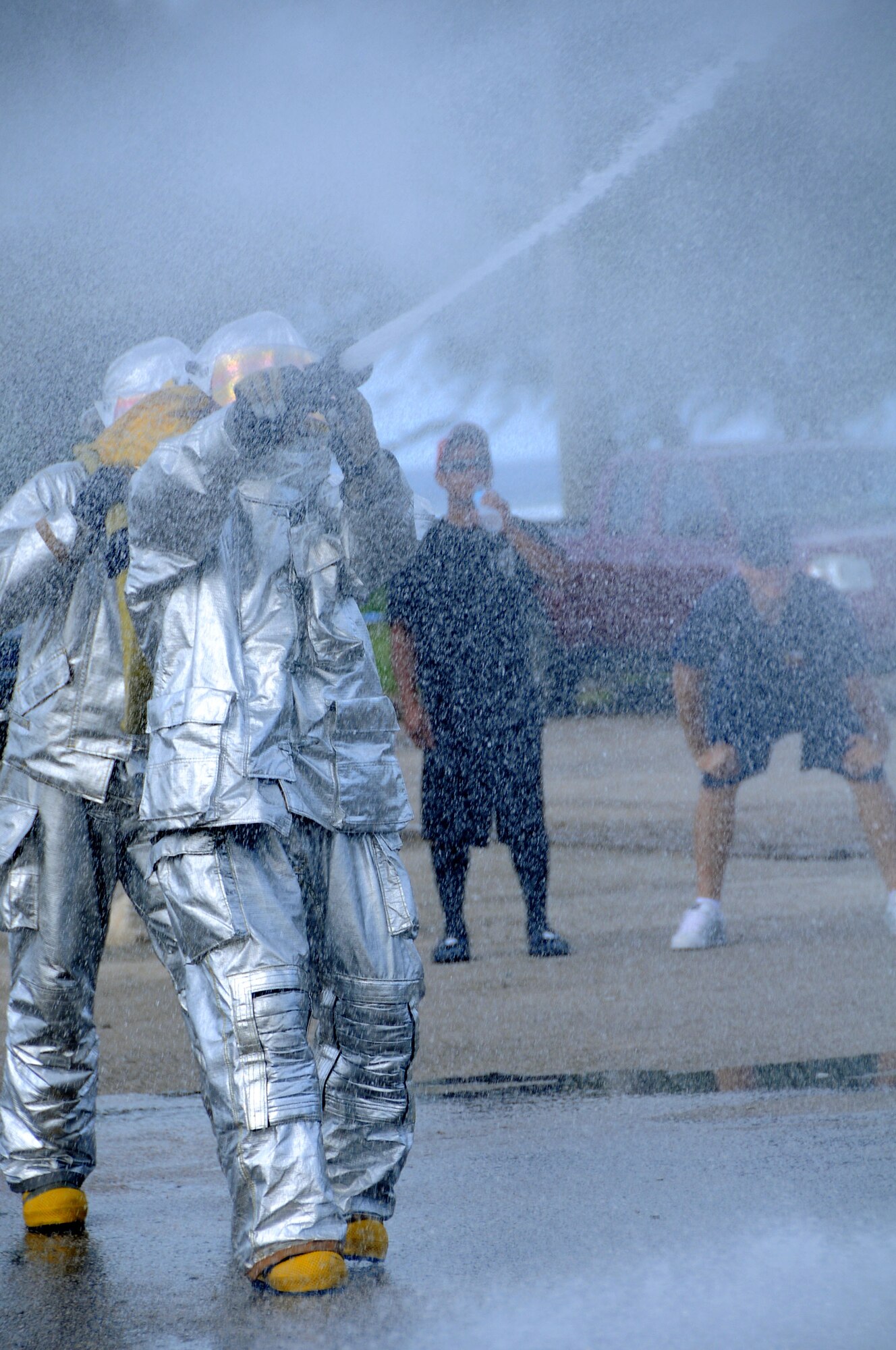 ANDERSEN AIR FORCE BASE, Guam - Members of Team Andersen's Fire and Emergency Services firefighters participate in the Water Polo portion at the 2008 Guam Fire Muster Competition at Paseo Park Oct. 12. The Fire Muster Competition was held during Fire Prevention Week. (U.S. Air Force photo by Airman 1st Class Courtney Witt)