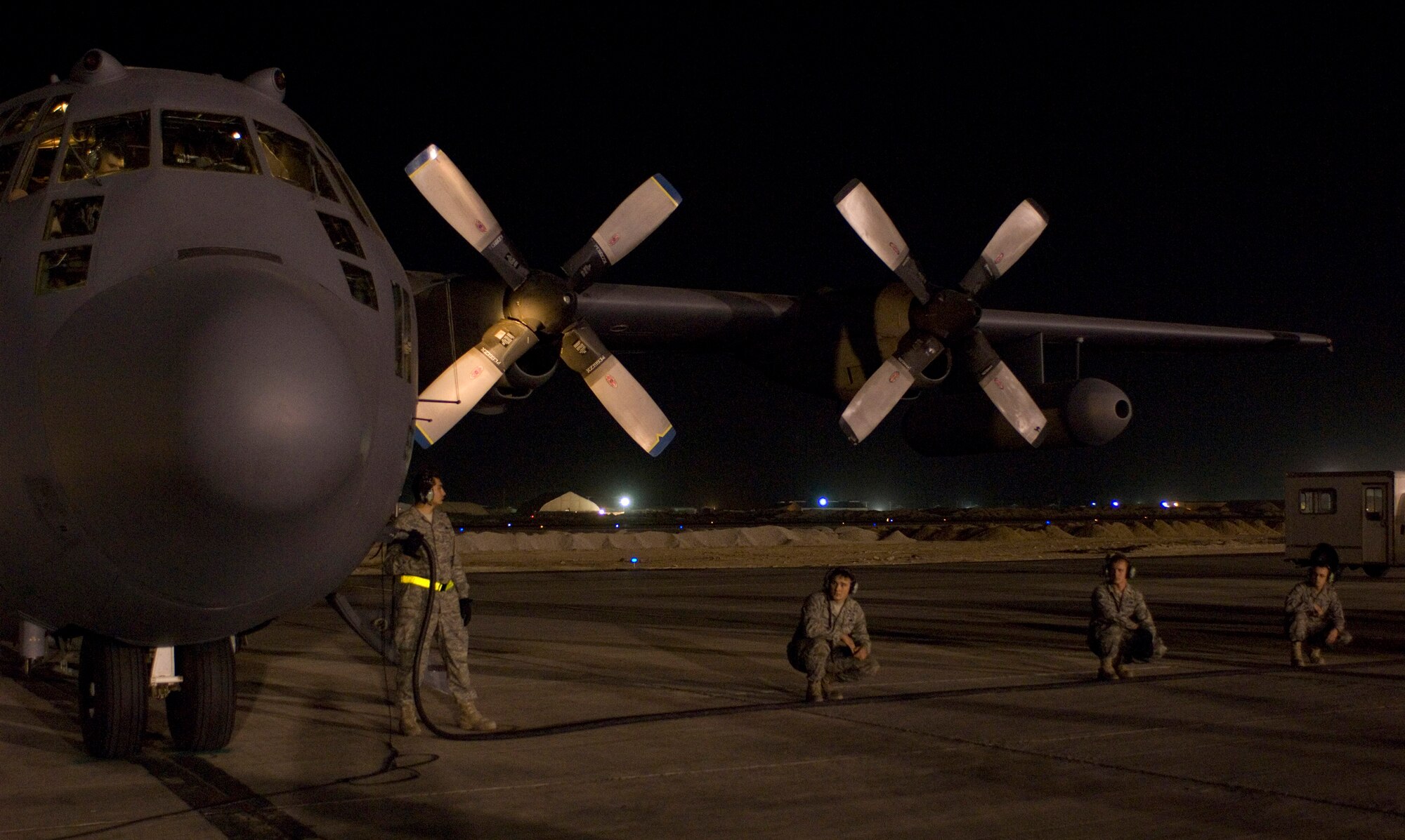 Maintenance Airmen from the 41st Expeditionary Aircraft Maintenance Unit prepare to launch an EC-130H Compass Call on the flightline at Bagram Air Field, Afghanistan, Oct. 6. Airmen from each maintenance specialty are present for each launch in order to expedite the repair of any problems that might arise. This maintenance teamwork has helped the 41st Expeditionary Electronic Combat Squadron fly more than 10,000 combat hours in support of Operation Enduring Freedom. (U.S. Air Force photo by Staff Sgt. Rachel Martinez/Released)