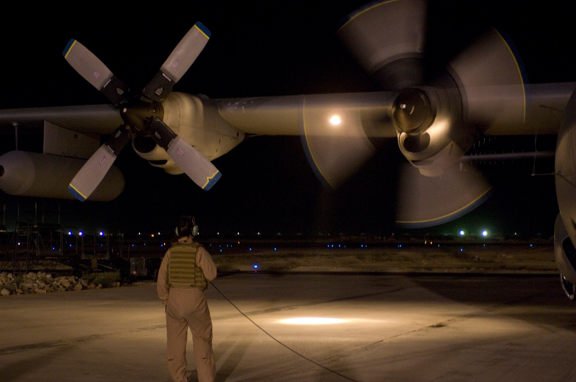Senior Airman Sarah McRae, an airborne maintenance technician with the 41st Expeditionary Electronic Combat Squadron, monitors the propellers of an EC-130H Compass Call prior to a mission at Bagram Air Field, Afghanistan, Oct. 6. The 41st EECS conducts communications jamming with the EC-130H and has flown more than 10,000 combat hours in support of Operation Enduring Freedom. Airman McRae is responsible for keeping the mission systems running in flight and has flown more than 220 combat sorties. (U.S. Air Force photo by Staff Sgt. Rachel Martinez/Released)