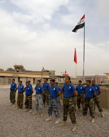 Iraqi members of 5th Provincial Security Forces stand in formation at Outpost Delta in Karmah, Iraq, Oct. 12, 2008. The Iraqi security forces conducted training with Marines of Charlie Co., Task Force 1st Battalion, 3rd Marine Regiment, Regimental Combat Team 1, to further advance their level of offensive and defensive capabilities. (U.S. Marine Corps photo by Lance Cpl. Geoffrey T. Campbell/Released)