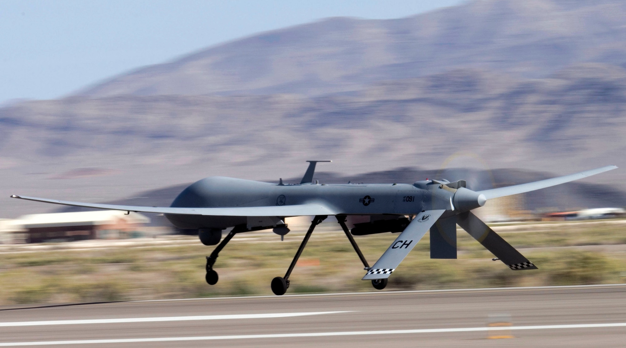An MQ-1 Predator, like this one, fired an Air-to-Ground Missile-114 against enemies of Afghanistan on Oct. 12. The MQ-1 is a medium-altitude, long-endurance, unmanned aircraft system. The primary mission of the UAS is interdiction and conducting armed reconnaissance against critical, perishable targets. (U.S. Air Force Photo/Senior Airman Larry E. Reid Jr.)