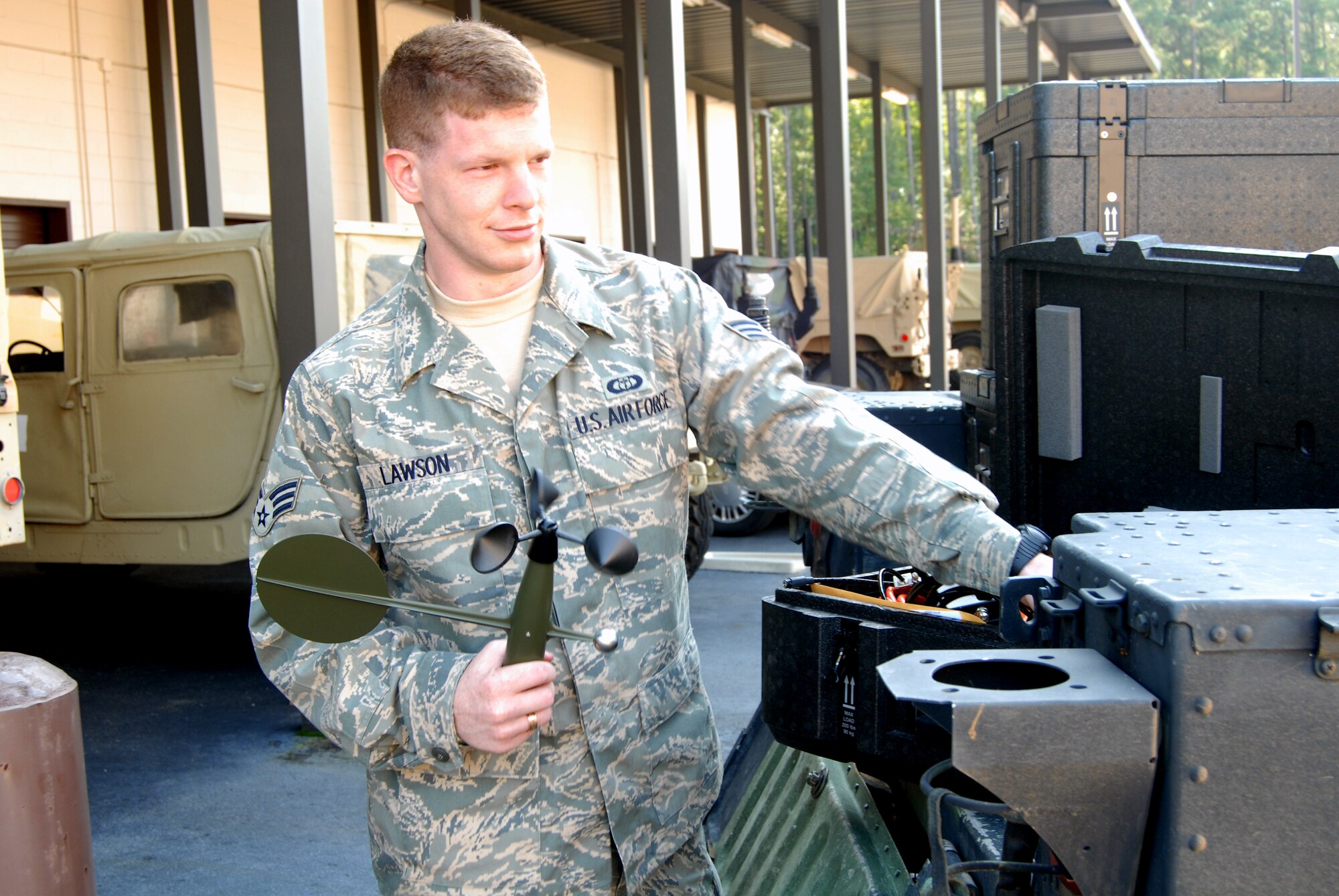 Senior Airman J.B. Lawson, 18th Weather Squadron, inventories the TMQ-53 weather sensor which provides meteorological observations in remote locations. (U.S. Air Force Photo by Emily Smith)