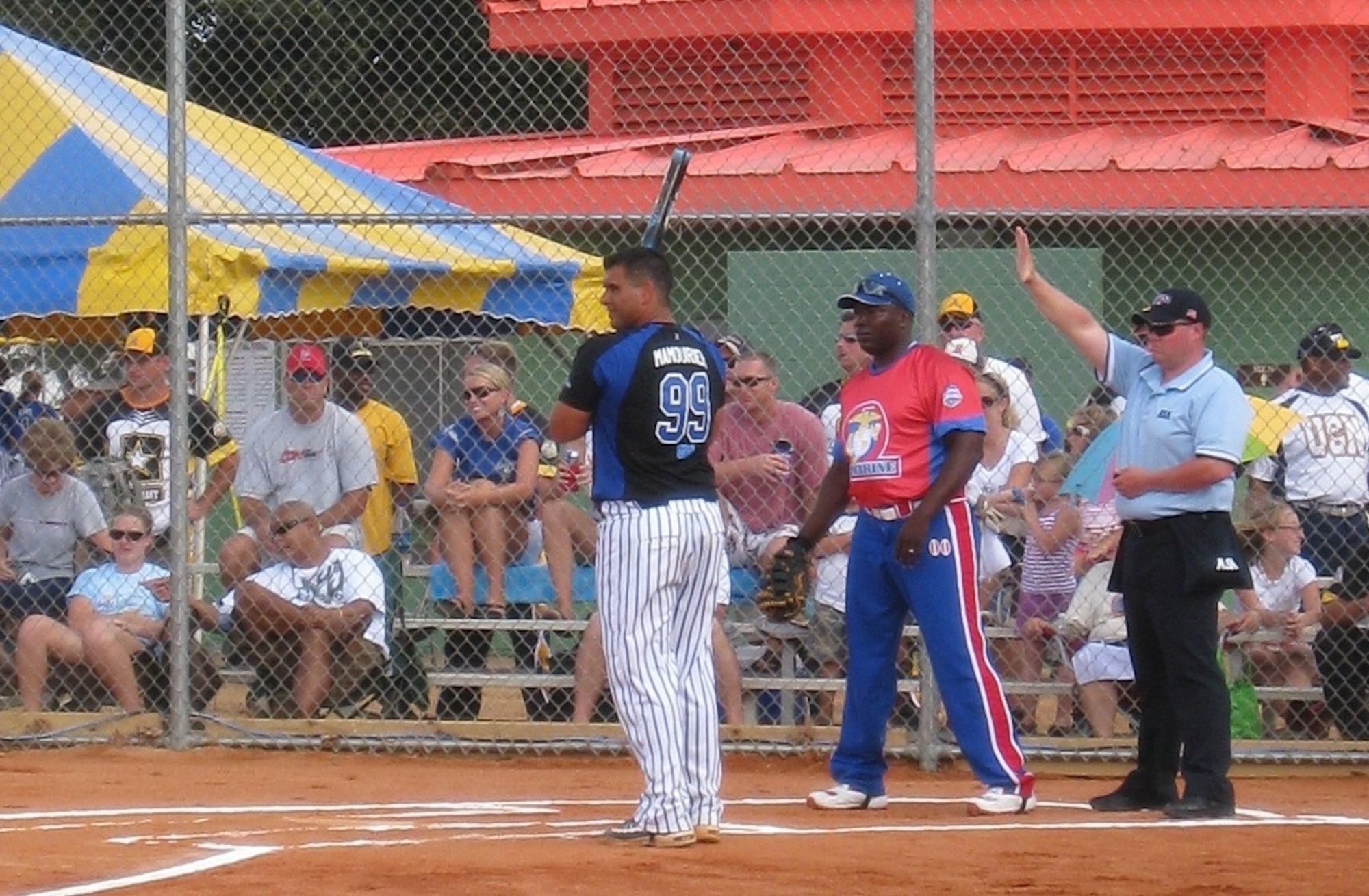 Capt. Bill "Mamo" Mamourieh, 1st Special Operations Wing executive officer, steps up to the plate at the recent all-services slow-pitch softball tournament in Pensacola. Captain Mamourieh and Staff Sgt. Christopher Bast, 1st Special Operations Equipment Maintenance Squadron, represented Hurlburt Field on the all-Air Force team, which took second place in the tournament.
