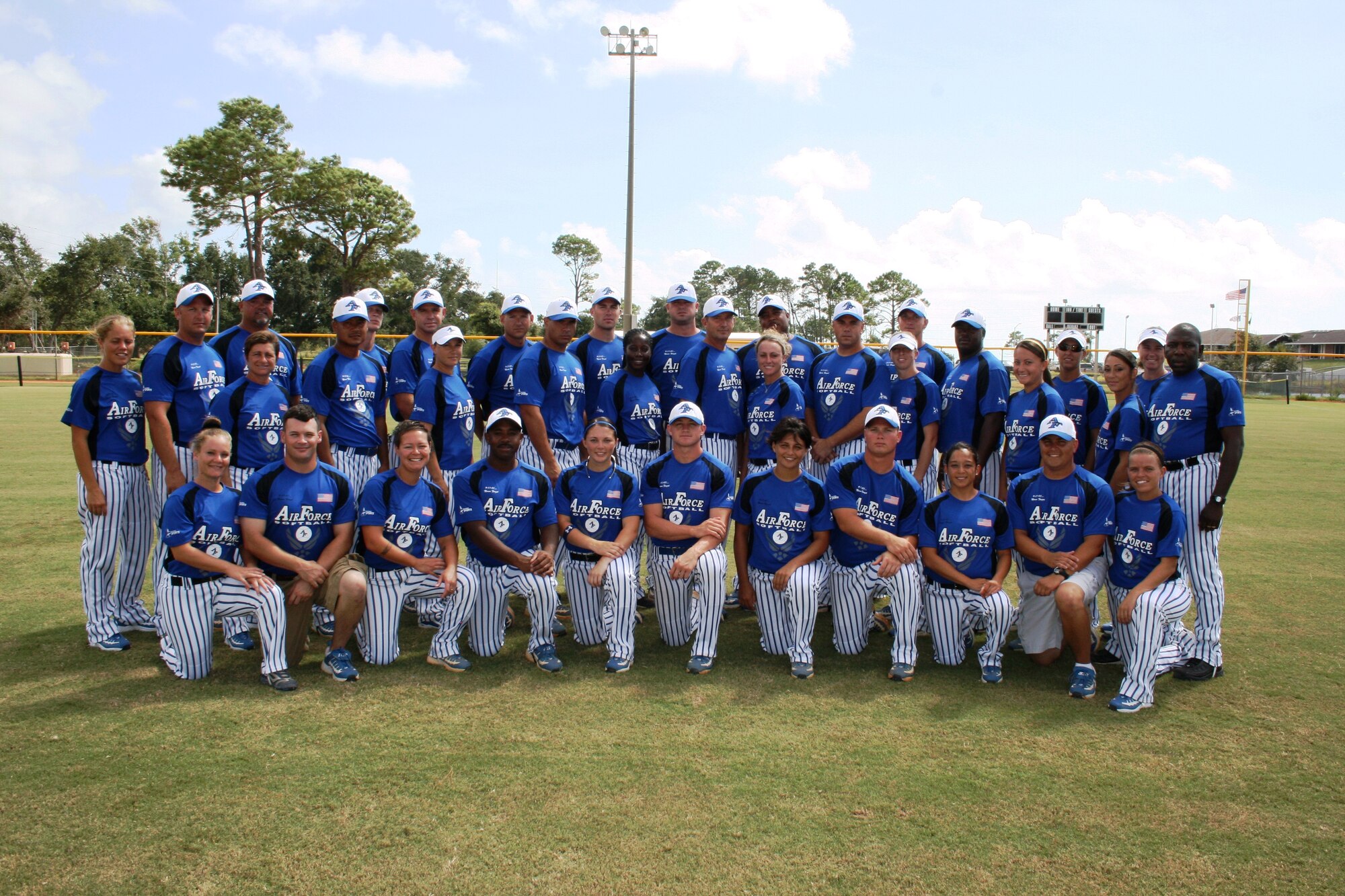 The all-Air Force slow-pitch softball team poses the at the recent all-services tournament in Pensacola. Two Hurlburt Airmen, Capt. Bill "Mamo" Mamourieh, 1st Special Operations Wing executive officer, and Staff Sgt. Christopher Bast, 1st Special Operations Equipment Maintenance Squadron, were on the team, which took second place in the tournament.