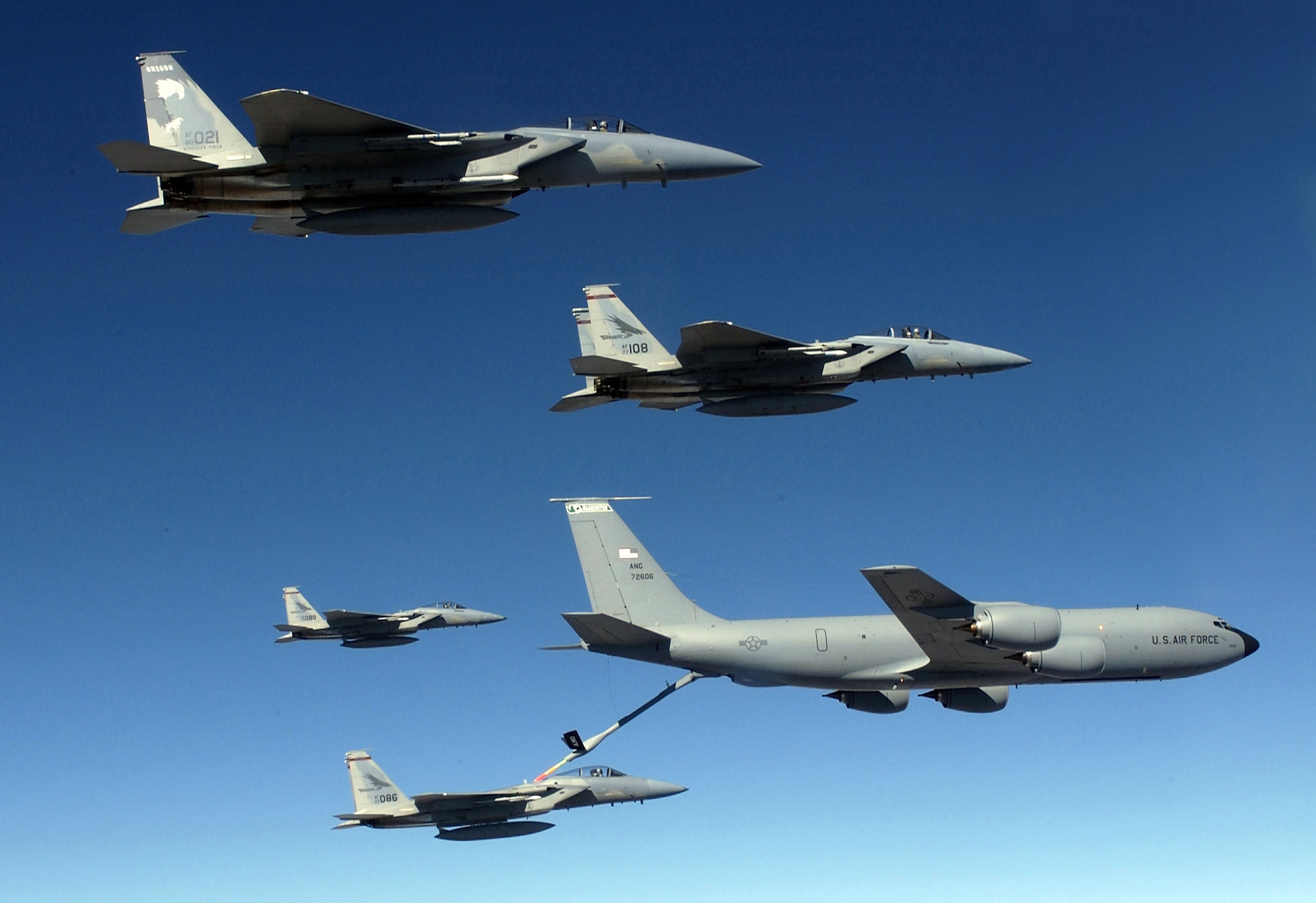 The KC-135 Stratotanker, like the one shown here refuelling F-15 Eagles, was featured recently on National Public Radio's Morning Edition.  (U.S. Air Force photo/Staff Sgt. James L. Harper Jr.)