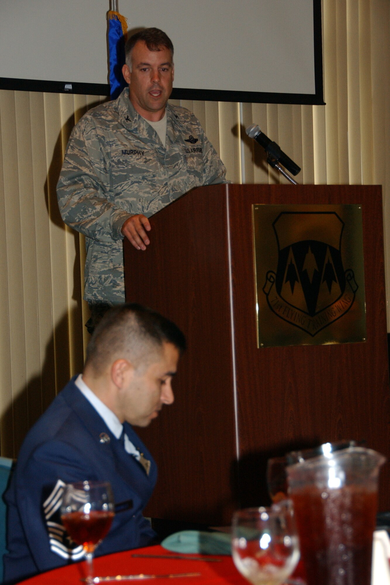 Col. Richard Murphy, 71st Flying Training Wing vice commander, speaks at Team Vance's National Hispanic American Heritage luncheon Oct. 14 at the Vance Collocated Club. About 60 people attended the luncheon. U.S. Air Force photo by Staff Sgt. Brian Hill.