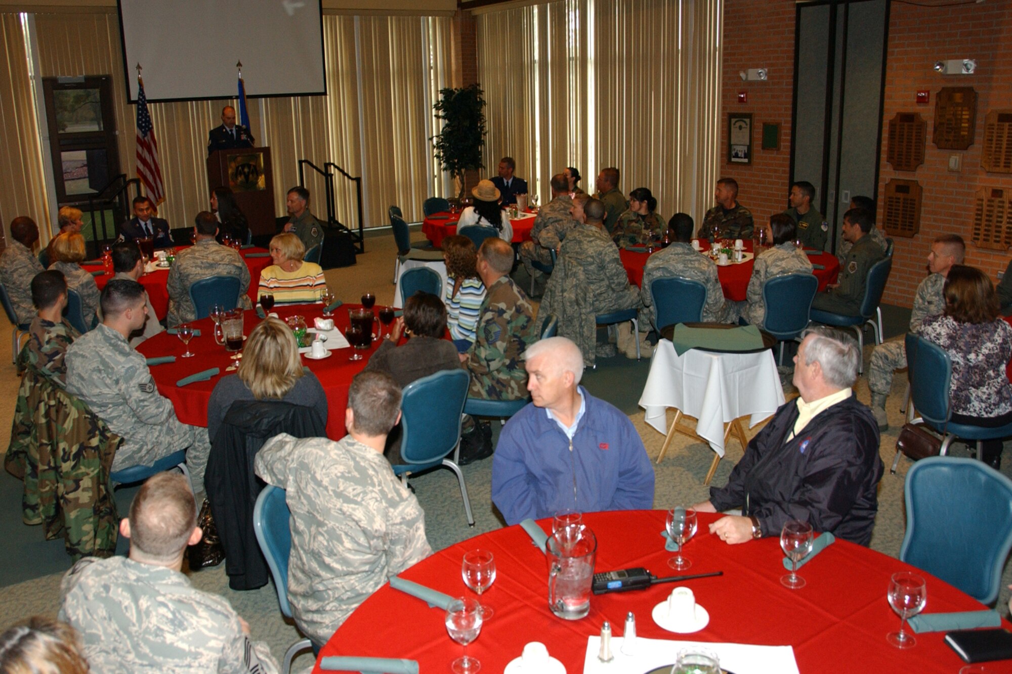 Staff Sgt. John Wade, 71st Flying Training Wing Equal Opportunity, performs master of ceremonies duties at Team Vance's National Hispanic American Heritage luncheon Oct. 14 at the Vance Collocated Club. About 60 people attended the luncheon. U.S. Air Force photo by Staff Sgt. Brian Hill.