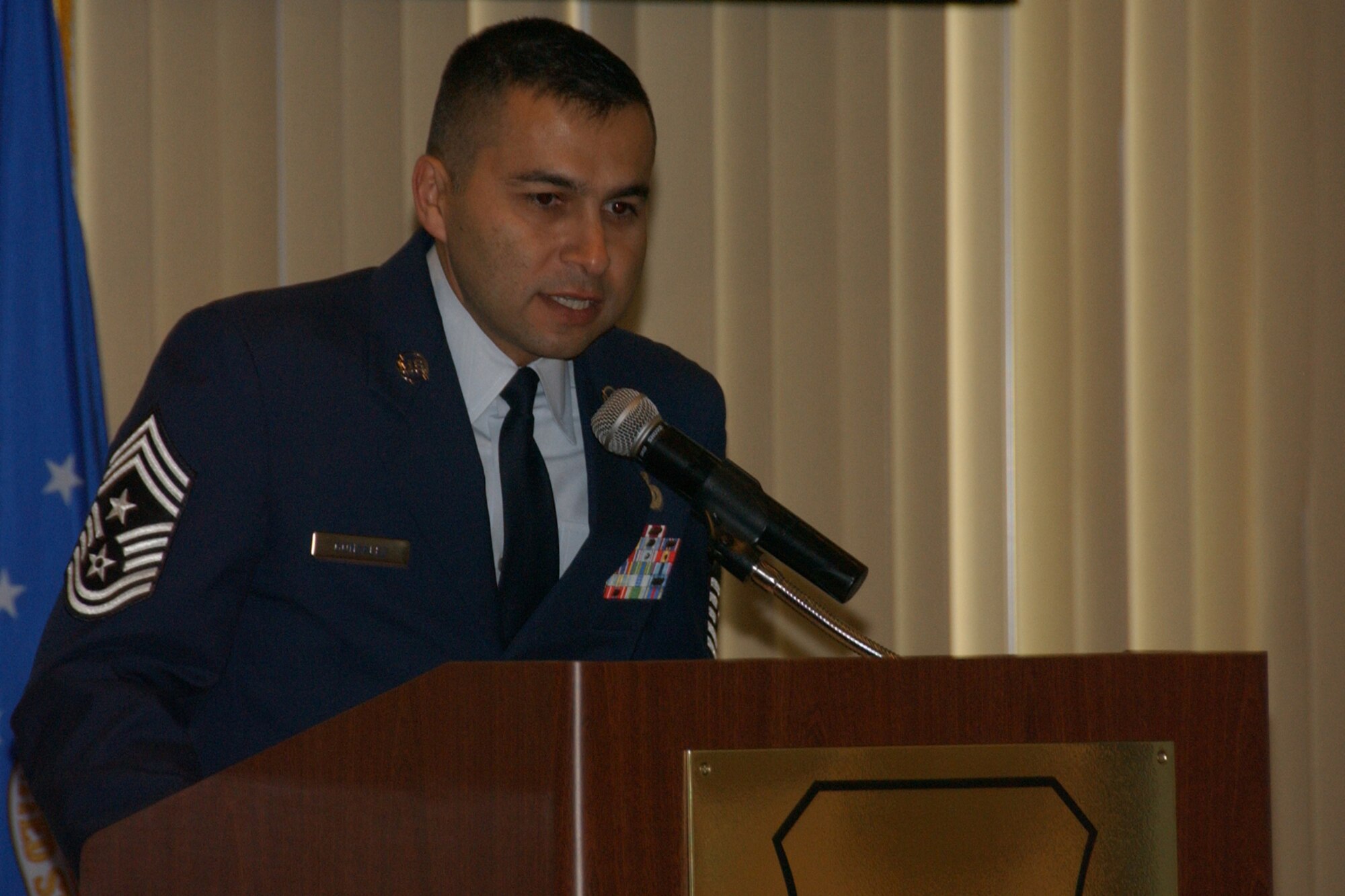 Chief Master Sgt. Ruben Gonzalez, 71st Flying Training Wing command chief, speaks at Team Vance's National Hispanic American Heritage luncheon Oct. 14 at the Vance Collocated Club. About 60 people attended the luncheon. U.S. Air Force photo by Staff Sgt. Brian Hill.