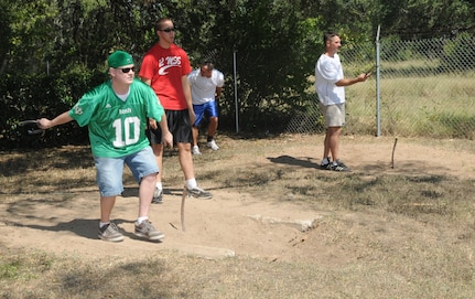 Contestants try their hand at horseshoes during Ocktoberfest 2008 celebrations Oct. 10 at Eberle Park. Airmen, coworkers, family members and supervisors spent the day celebrating enlisted Airmen for their contributions to the Air Force and Nation. (U.S. Air Force photo by Rich McFadden)