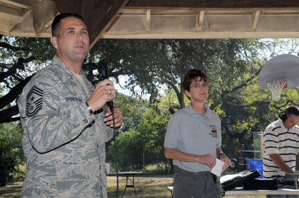 Chief Master Sgt. Max Grindstaff, 12th Flying Training Wing command chief master sergeant, and Col. Jacqueline Van Ovost, 12th Flying Training Wing commander, speak at Ocktoberfest 2008 celebrations at Eberle Park on Oct. 10. Airmen, coworkers, family members and supervisors spent the day celebrating enlisted Airmen for their contributions to the Air Force and Nation. (U.S. Air Force photo by Rich McFadden)
