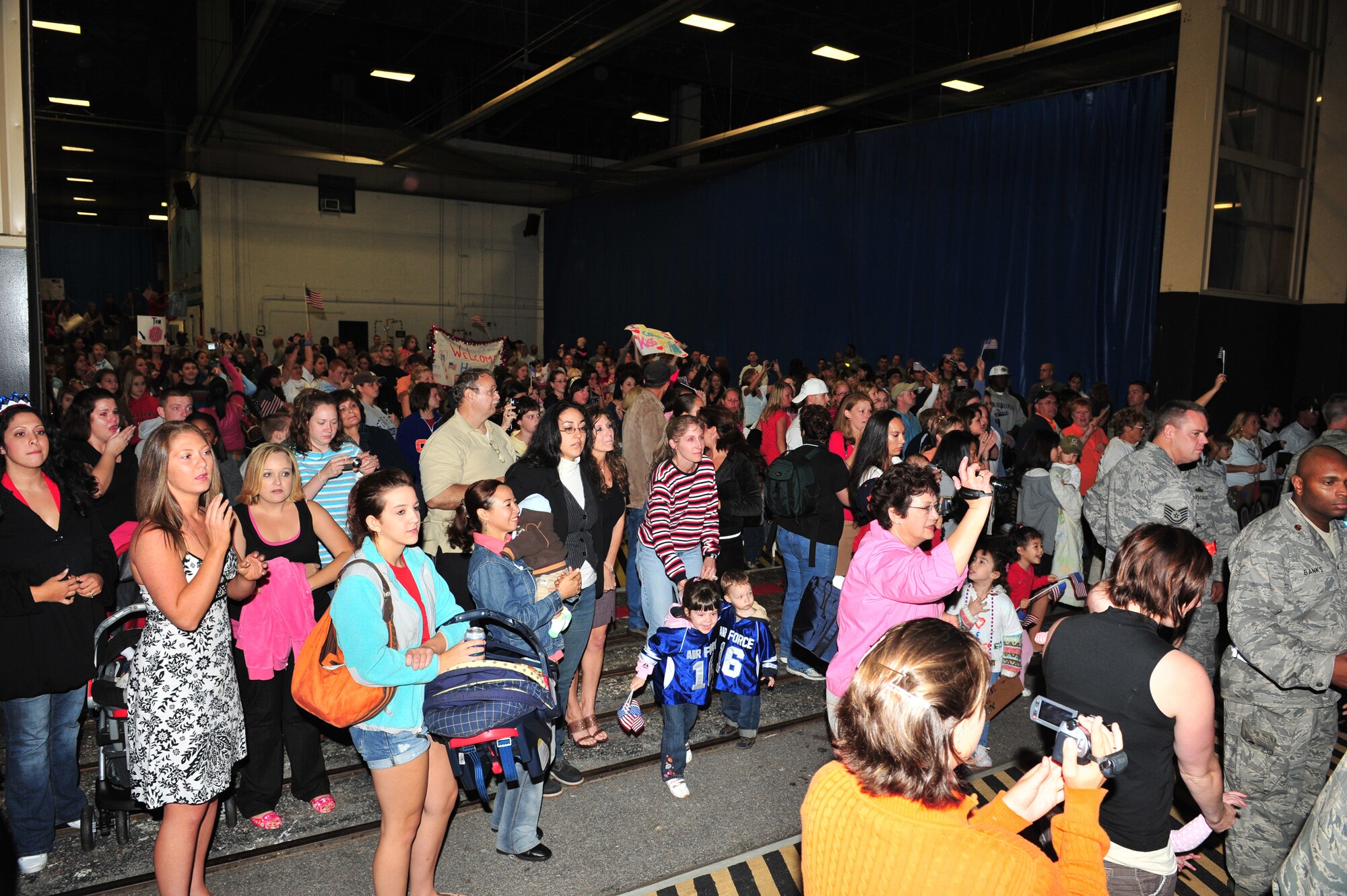 SHAW AIR FORCE BASE, S.C. --  The families and friends of approximately 340 Airmen await the arrival of their loved ones on their return from a four-month deployment to Southwest Asia Oct. 13. The Airmen supported the 77th Fighter Squadron and its pilots during the deployment. (U.S. Air Force photo/Tech. Sgt. Josef Cole)