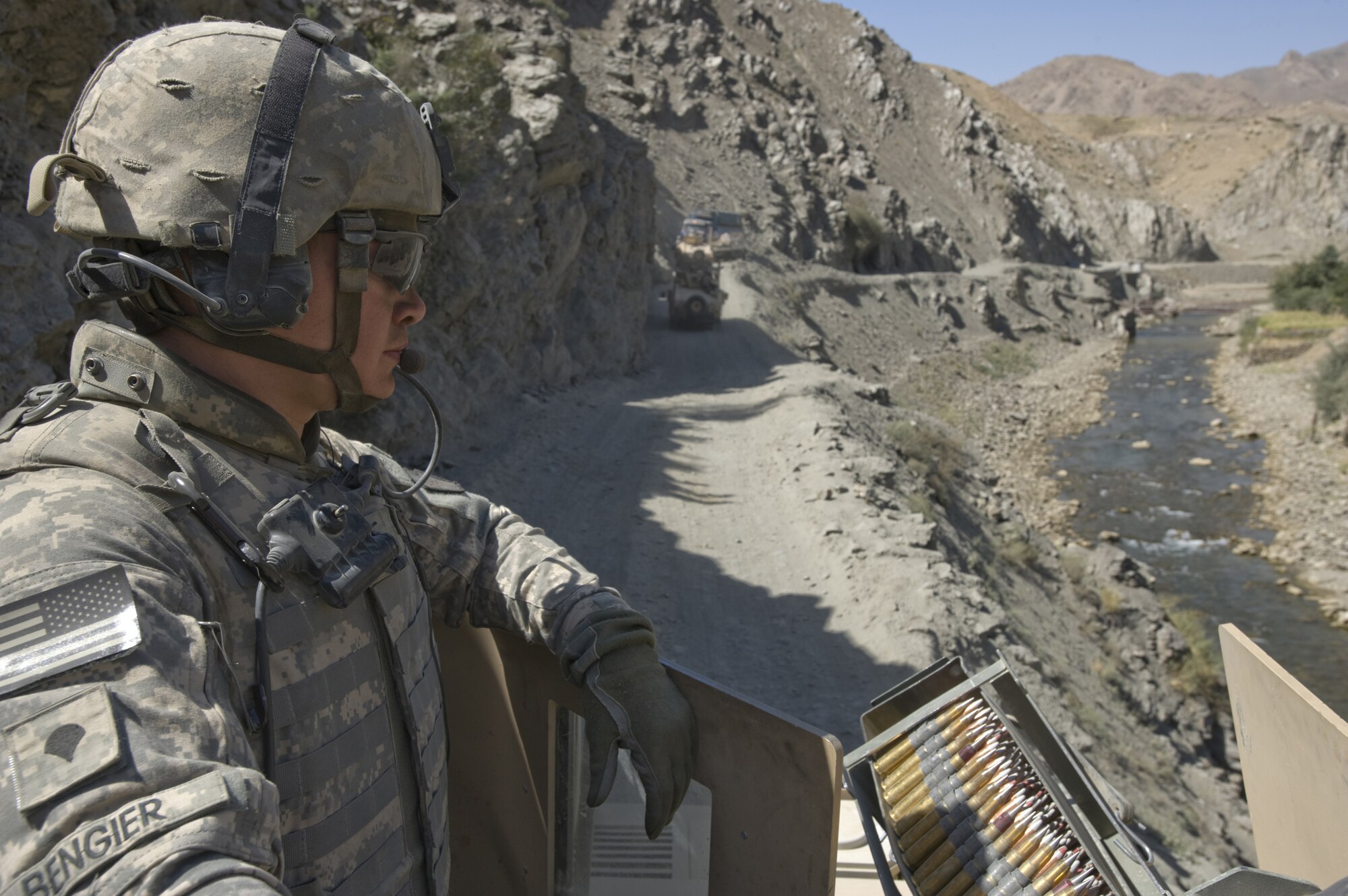 PACHA HAWK, Afghanistan – Army Spc. Brian Bengier, Kapisa and Parwan Provincial Reconstruction Team, stands guard as fellow team members operate a makeshift medical clinic in an isolated Afghan village. The joint-service team has members from the Air Force, Army and Navy assigned to it. SFC Hopkins is deployed from the 3rd Platoon, Delta Company, 3rd Battalion, 103rd Armor, Pennsylvania Army National Guard. (U.S. Air Force photo/Master Sgt. Keith Brown) 