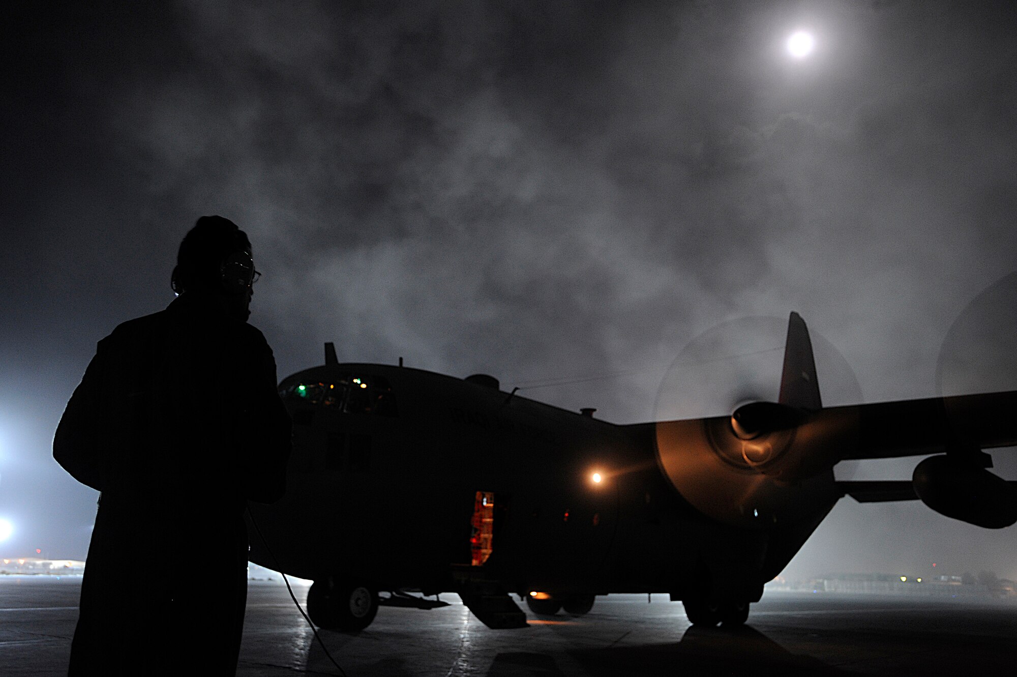 An Iraqi airman waits for cargo for a C-130 aircraft Oct. 11 at Joint Base Balad, Iraq. The Iraqi airman was on a cargo resupply mission with members of the U.S. Air Force 370th Air Expeditionary Advisory Squadron. He is assigned to 23rd Squadron, which operates three C-130s used for transporting troops, supplies and distinguished visitors. (U.S. Air Force photo/Airman 1st Class Jason Epley) 

