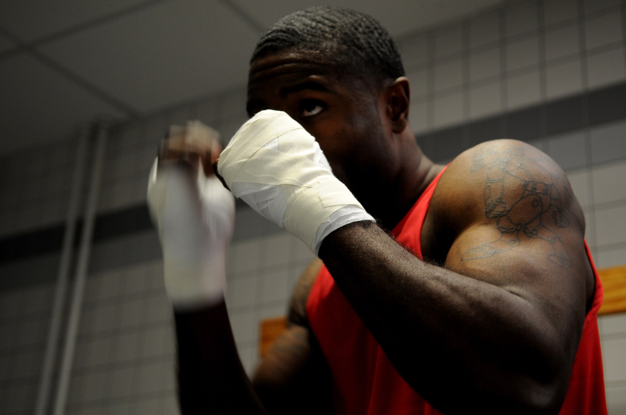 United States Army Sgt. Frank Horsey, 406th Maintenance, Kaiserslautern, warms up prior to a boxing match, Vogelweh Air Base, Germany, Oct. 11, 2008. Army Sgt. Horsey won his match against U.S. Air Force Staff Sgt. Joseph Buyson, 435th Munitions Squadron, Ramstein Air Base. (U.S. Air Force photo by Airman 1st Class Grovert Fuentes-Contreras)(Released)