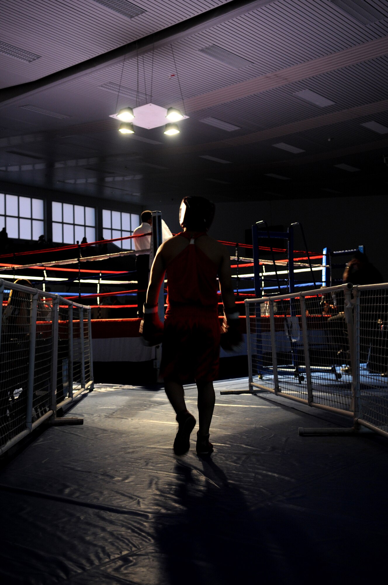 United States Army Pfc. Abel Ortegon, Aurvey Division, Shape, Belgium, enters the ring during a boxing match, Vogelweh Air Base, Germany, Oct. 11, 2008. Pfc. Ortegon was defeated by German boxer Vitali Frei from the Turngemeinde Worms Boxing Club. (U.S. Air Force photo by Airman 1st Class Grovert Fuentes-Contreras)(Released)