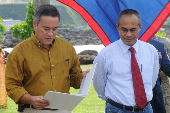 ANDERSEN AIR FORCE BASE, Guam - Governor Felix Camacho and Senator James Espaldon present a speech to Air Force Reserve recruits during a mass enlistment ceremony held at the Statue of Liberty Park in Hagatna, Guam, Oct. 9. Family members of the enlistees attended the ceremony as well as 44th Aerial Port Squadron members who stood by to welcome the future servicemembers. (U.S. Air Force photo Senior Airman Sonya Croston)