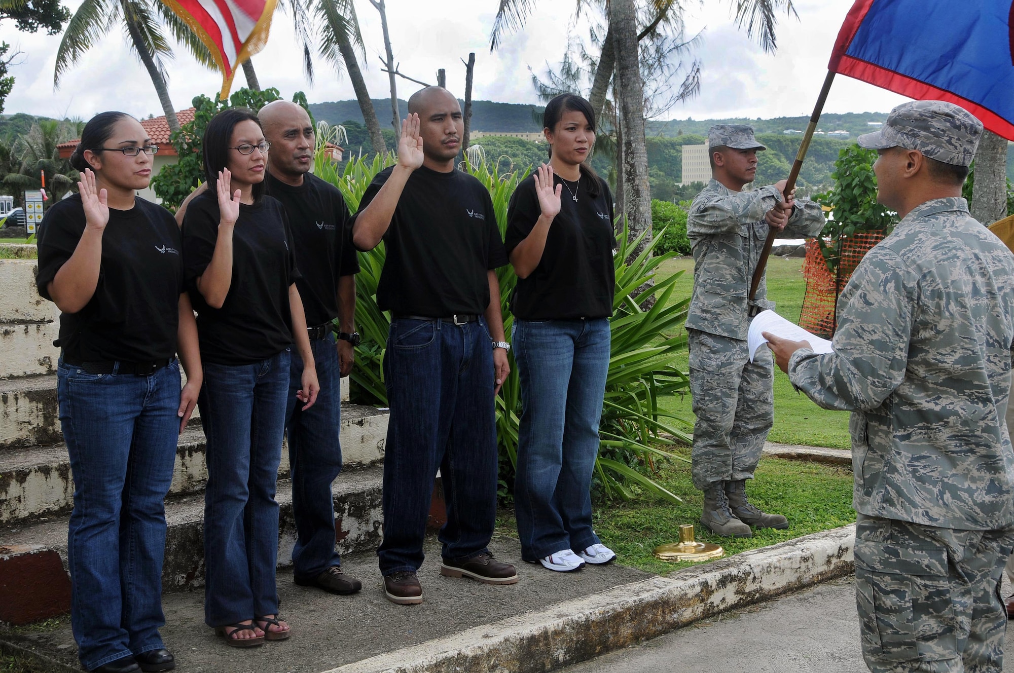 ANDERSEN AFB, Guam - Air Force Reserve recruits raise their right hand to swear in the oath of enlistment given by Capt. Patrick Lujan, officer in charge, Air Freight, 44th Aerial Port Squadron, at the Statue of Liberty Park in Hagatna, Guam, Oct. 9. Enlistees Rebecca Huffer, Noli Pegarido, Angel-Markay Mafnas, William Balansay and Angela Sablan will join the ranks here with 44th APS personnel after basic military training at Lackland Air Force Base, Texas. (U.S. Air Force photo Senior Airman Sonya Croston) 