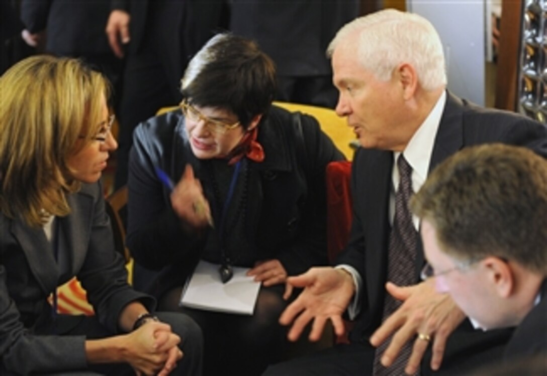 Secretary of Defense Robert M. Gates and Spanish Minister of Defense Carme Chacon discuss defense issues during the Budapest NATO Conference in Budapest, Hungary, on Oct. 9, 2008.  