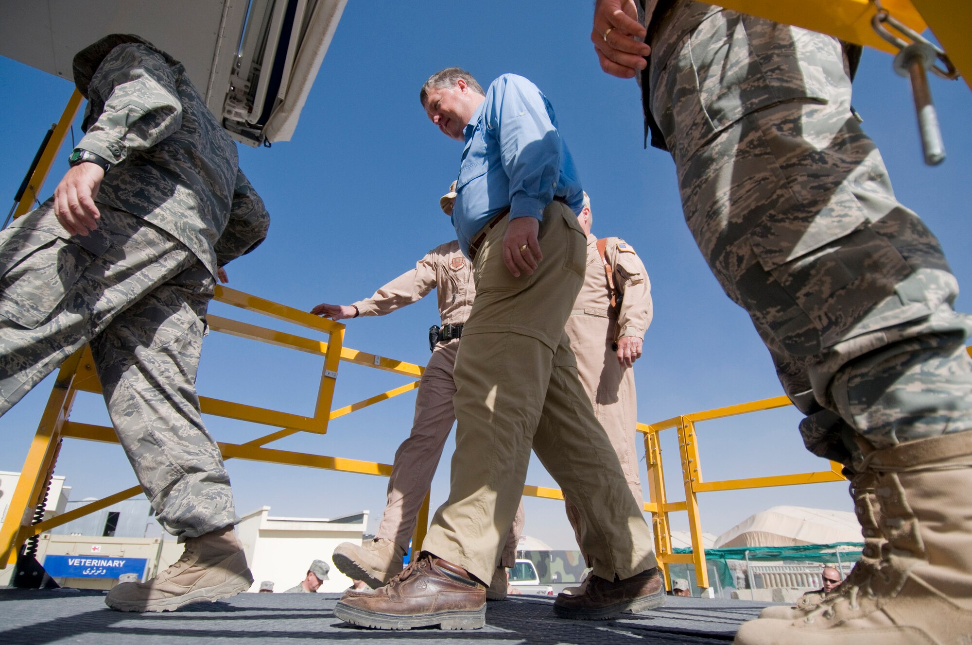 BAGRAM AIR FIELD, Afghanistan -- Secretary of the Air Force Michael Donley visits with the medical personnel of the 455th Air Expeditionary Wing here Oct. 15. Secretary Donley was given a demonstration of how critical care teams transport patients smoothly to and from facilities. (U.S. Air Force photo by Staff Sgt. Samuel Morse/Released)