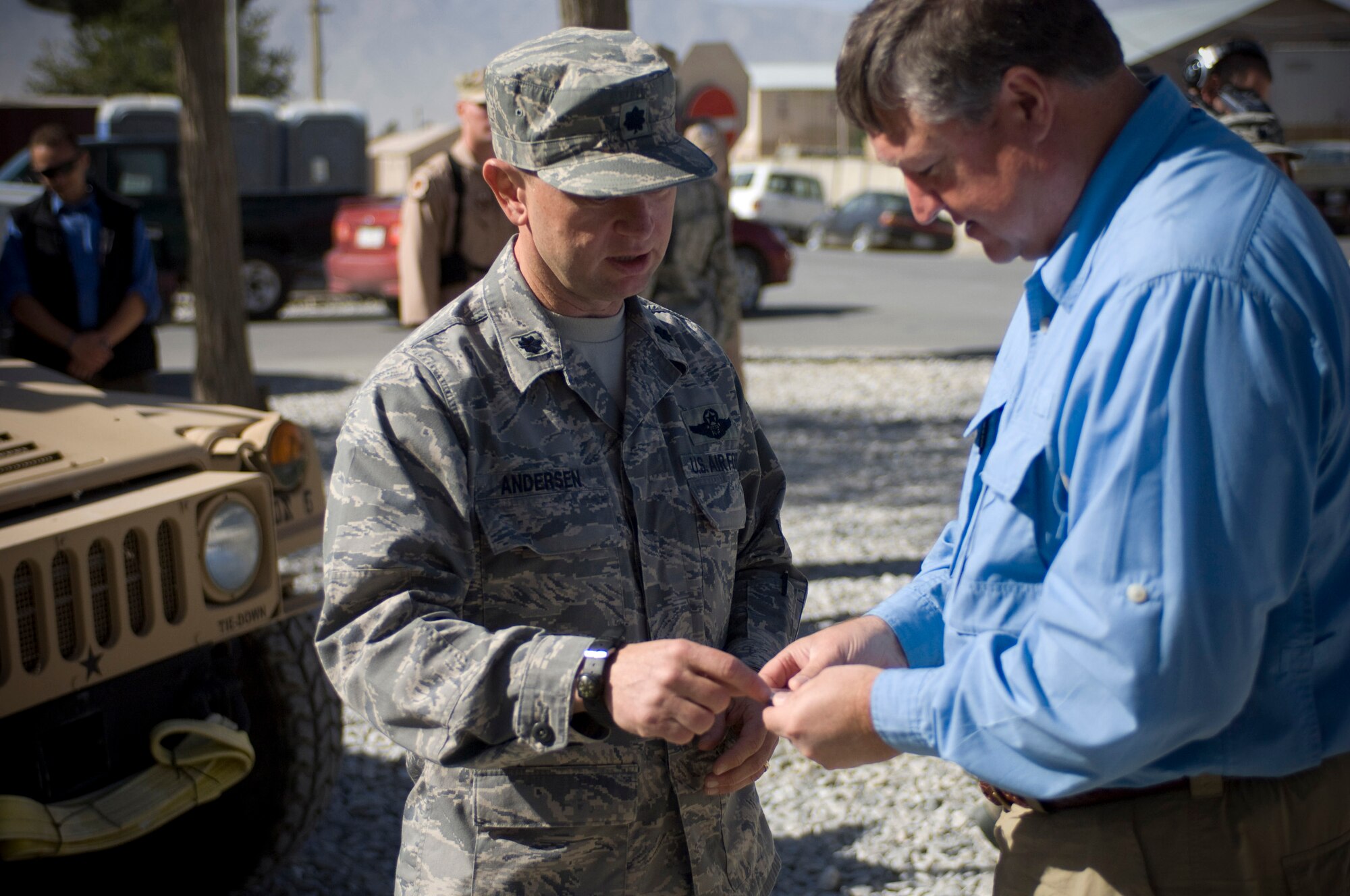 BAGRAM AIR FIELD, Afghanistan -- Lt. Col. William Andersen, Kapisa/Parwan Provincial Reconstruction Team commander, presents Secretary of the Air Force Michael Donley here Oct. 15. Secretary Donley learned about current and upcoming projects for the PRT and commented on how crucial their mission is for the betterment of Afghanistan. (U.S. Air Force photo by Staff Sgt. Samuel Morse/Released)