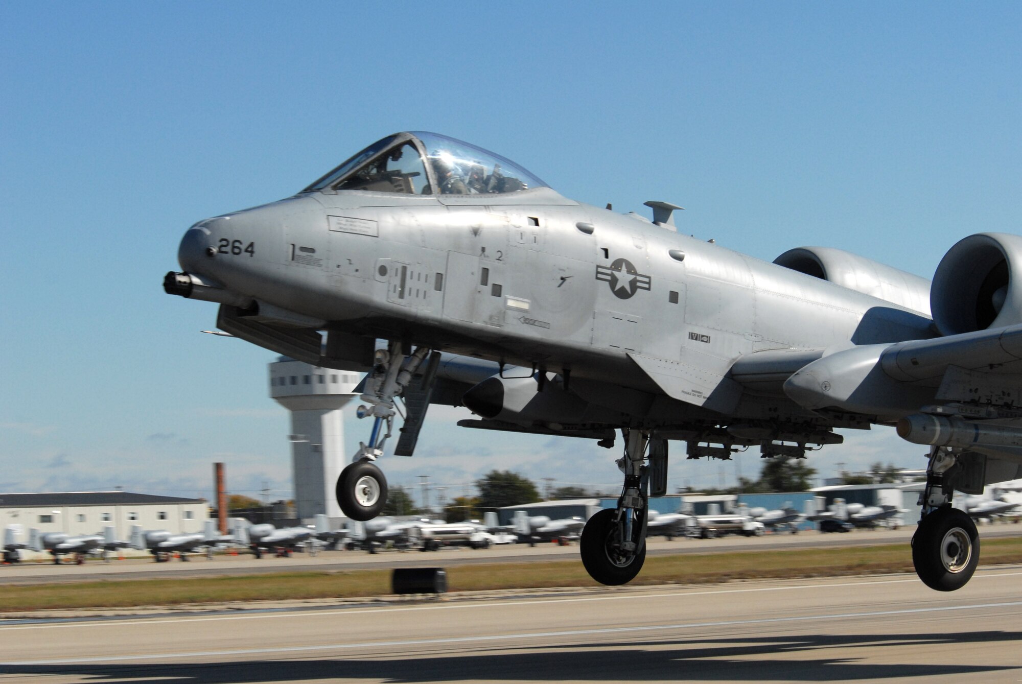 An A-10 Thunderbolt II from the 110th Fighter Wing, Michigan Air National Guard, takes off from the Salina, Kan., airport Oct. 15 for an orientation flight over the nearby Smoky Hill bombing and gunnery range.  Thirty A-10s from Air National Guard and Air Force Reserve units across the country have converged on Salina for Hawgsmoke 2008, which will pit active-duty, Reserve and Guard pilots from 14 squadrons against each other in a bienniel bomb and gunnery competition.  The competition will last through Oct. 18.  (U.S. Air Force photo/Maj. David Kurle)