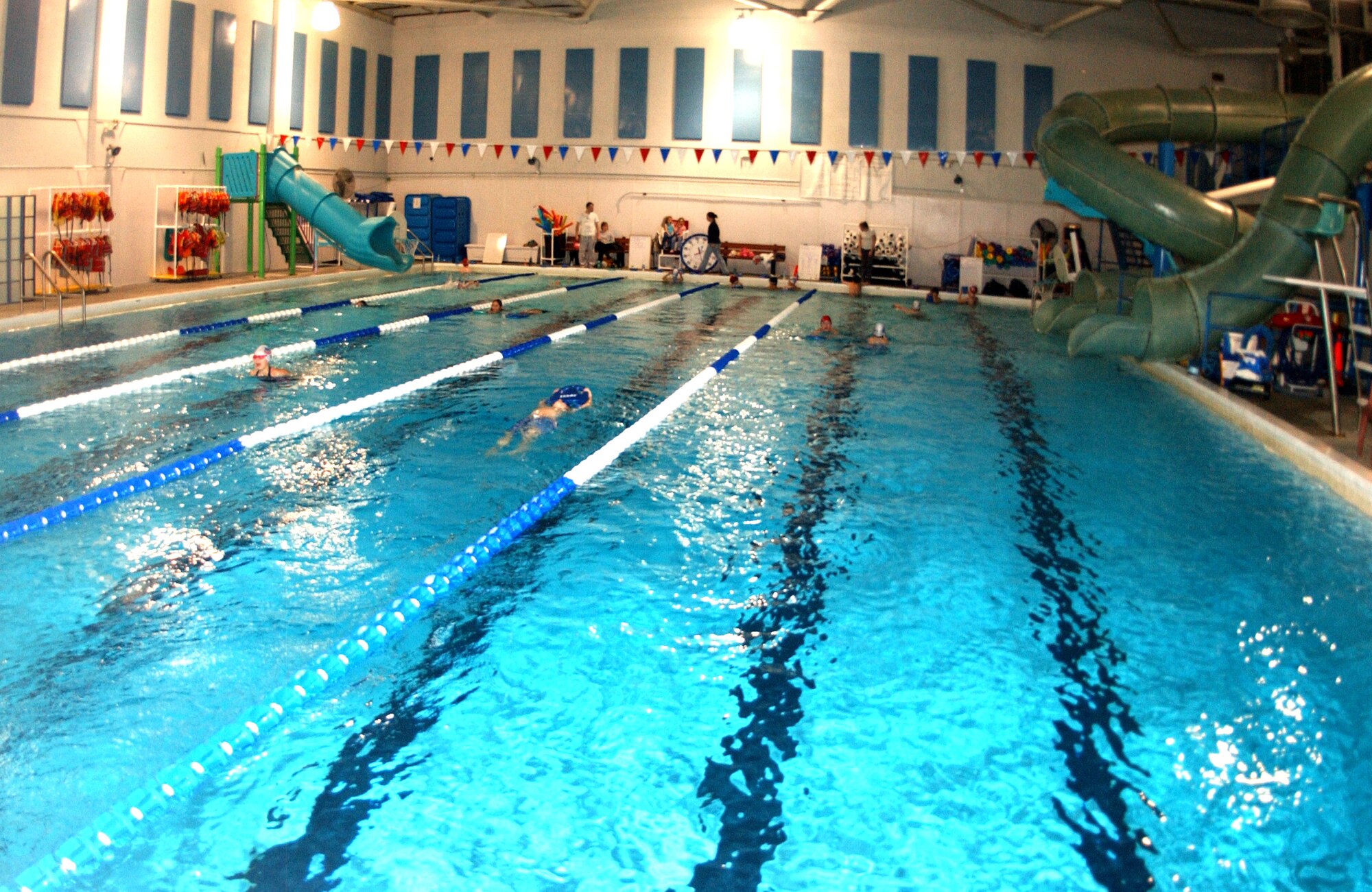 The Liquidators swim team complete laps at the indoor pool at the Baker Field House fitness center Oct. 13, 2008 at Eielson Air Force Base, Alaska. Military and civilians with base access can participate in the water aerobics class offered 3 times a week at the center to stay fit and beat Seasonal Affective Disorder, which is brought on by long, dark winter months. (U.S. Air Force photo by Airman Laura Max)