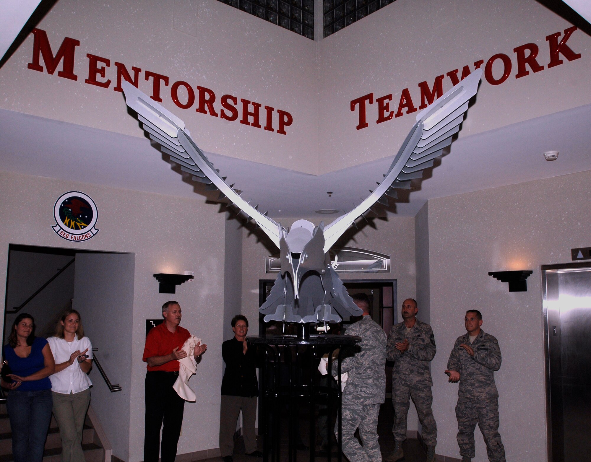 MCCONNELL AIR FORCE BASE, Kan. -- The 350th Air Refueling Squadron unveiled its American eagle statue at the 350th Air Refueling Squadron building 1185, Oct. 9.  The unveiled statue represents the past, present and future sacrifices Americans have and will continue to make to keep this country safe. (Photo by Staff Sgt. Ronald Lafosse)