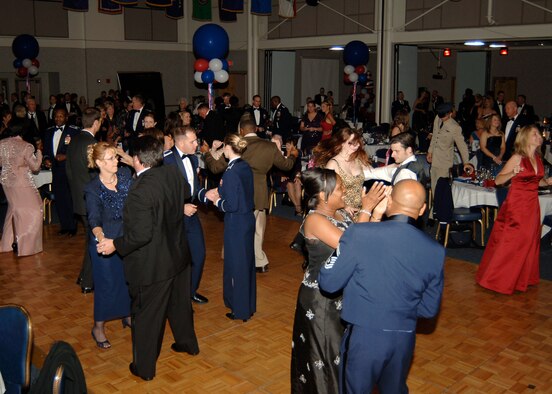 MCCONNELL AIR FORCE BASE, Kan. -- Guests dance to the music of the band Downtime after the official ceremony of the Air Force Ball concluded, Oct. 10. (Photo by Airman 1st Class Maria Ruiz) 