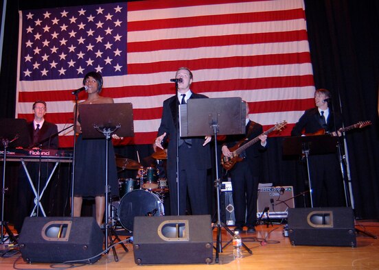 MCCONNELL AIR FORCE BASE, Kan. -- The band Downtime from performs an assortment of music: pop, Motown, blues and jazz for guests during the Air Force Ball, Oct. 10. (Photo by Airman 1st Class Maria Ruiz)