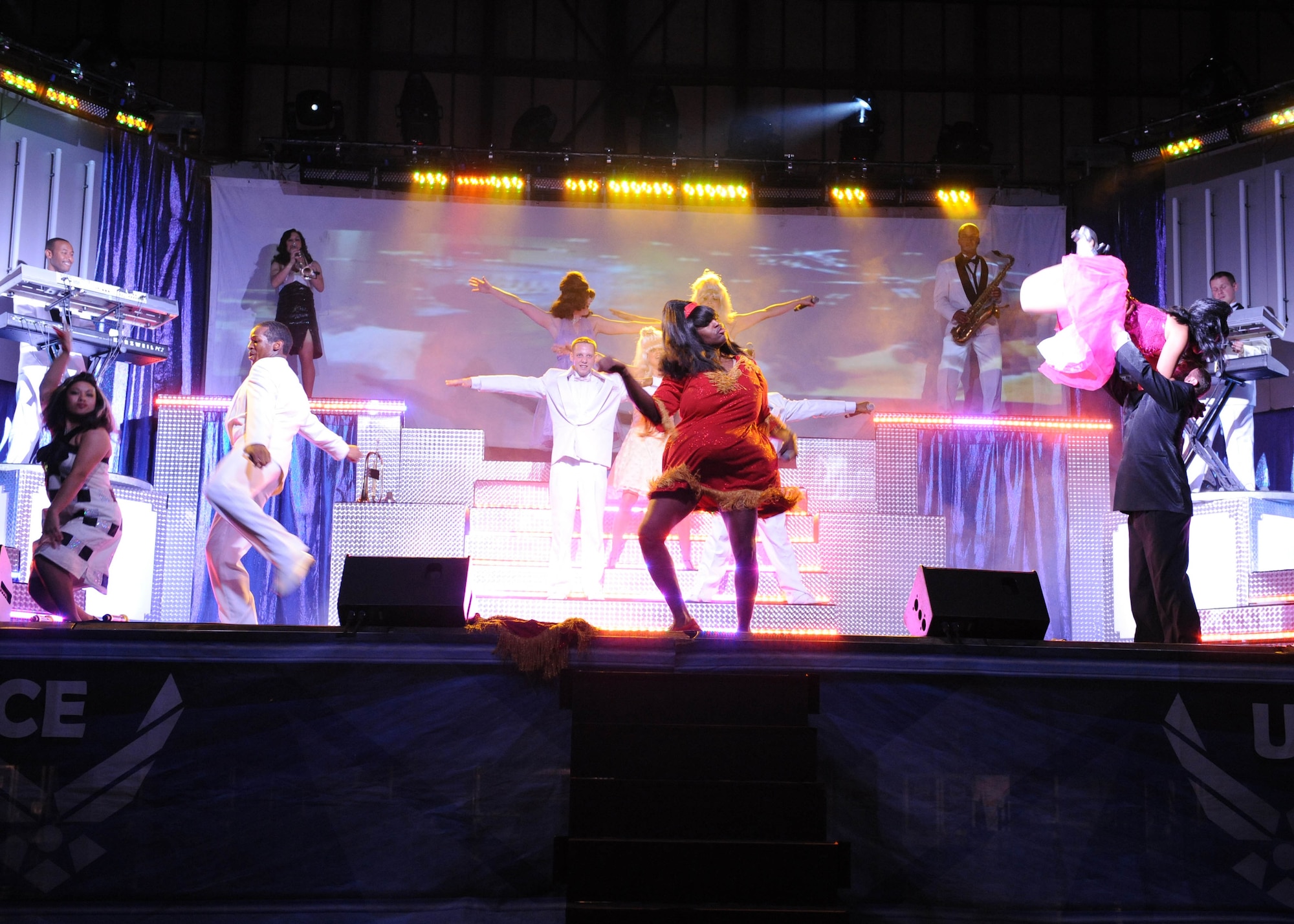 Tops In Blue performs the theme from the movie Hairspray "You Can't Stop the Beat" here at Seymour Johnson Air Force Base, N.C. Oct. 14, 2008. Tops in Blue are a combined group of 35 entertainers (singers and musicians) that to travel to Air Force Bases worldwide to preform for servicemembers. (U. S. Air Force photo by Airman 1st Class Whitney Stanfield)