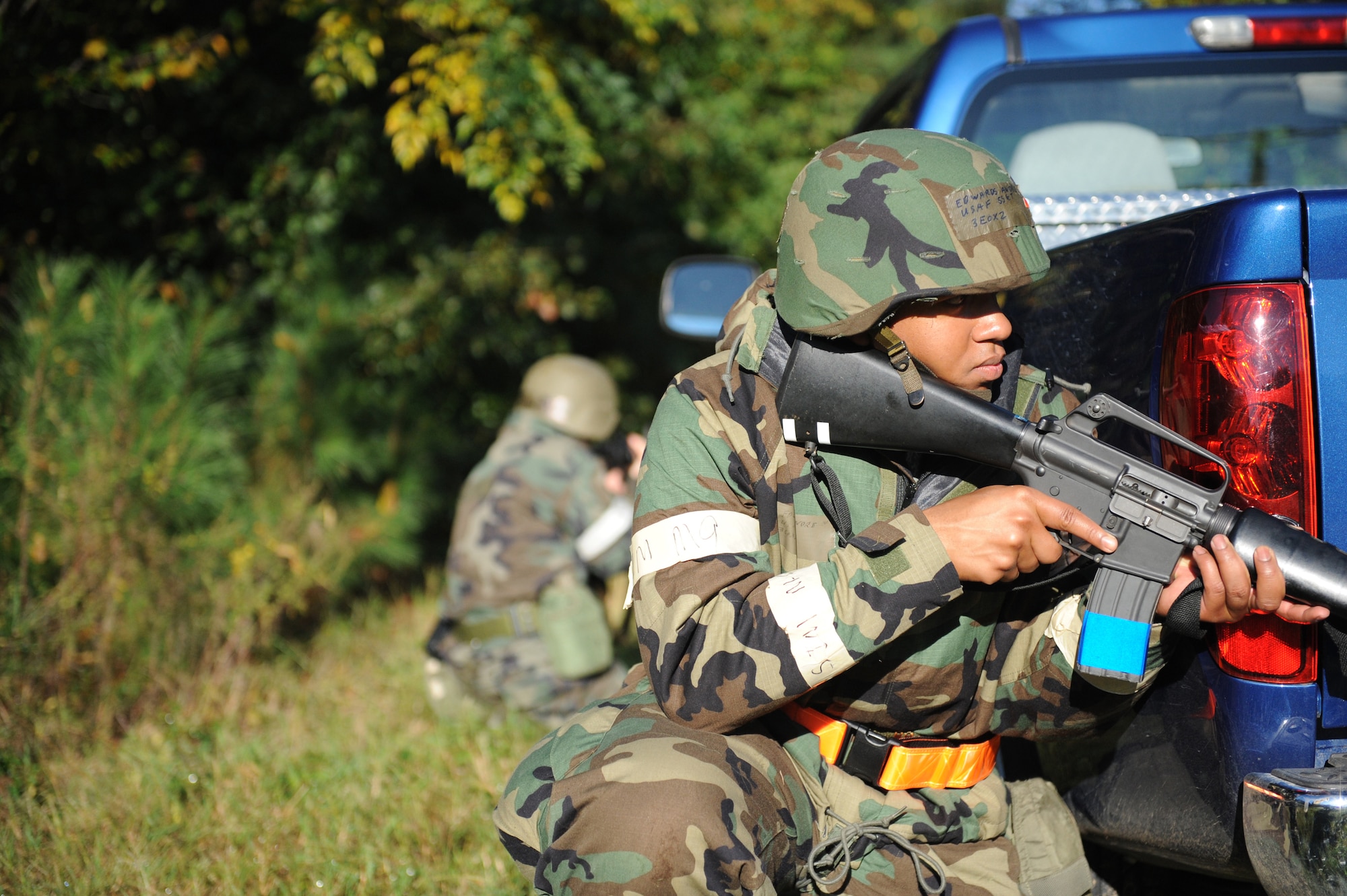 SHAW AIR FORCE BASE, S.C. -- Staff Sgt. Andre Edwards, 20th Civil Engineering Squadron, takes cover as simulated shots are fired in his direction during a Phase II Operational Readiness Exercise Oct. 15. OREs test and evaluate deployment readiness. (U.S. Air Force photo/Staff Sgt. Henry Hoegen)