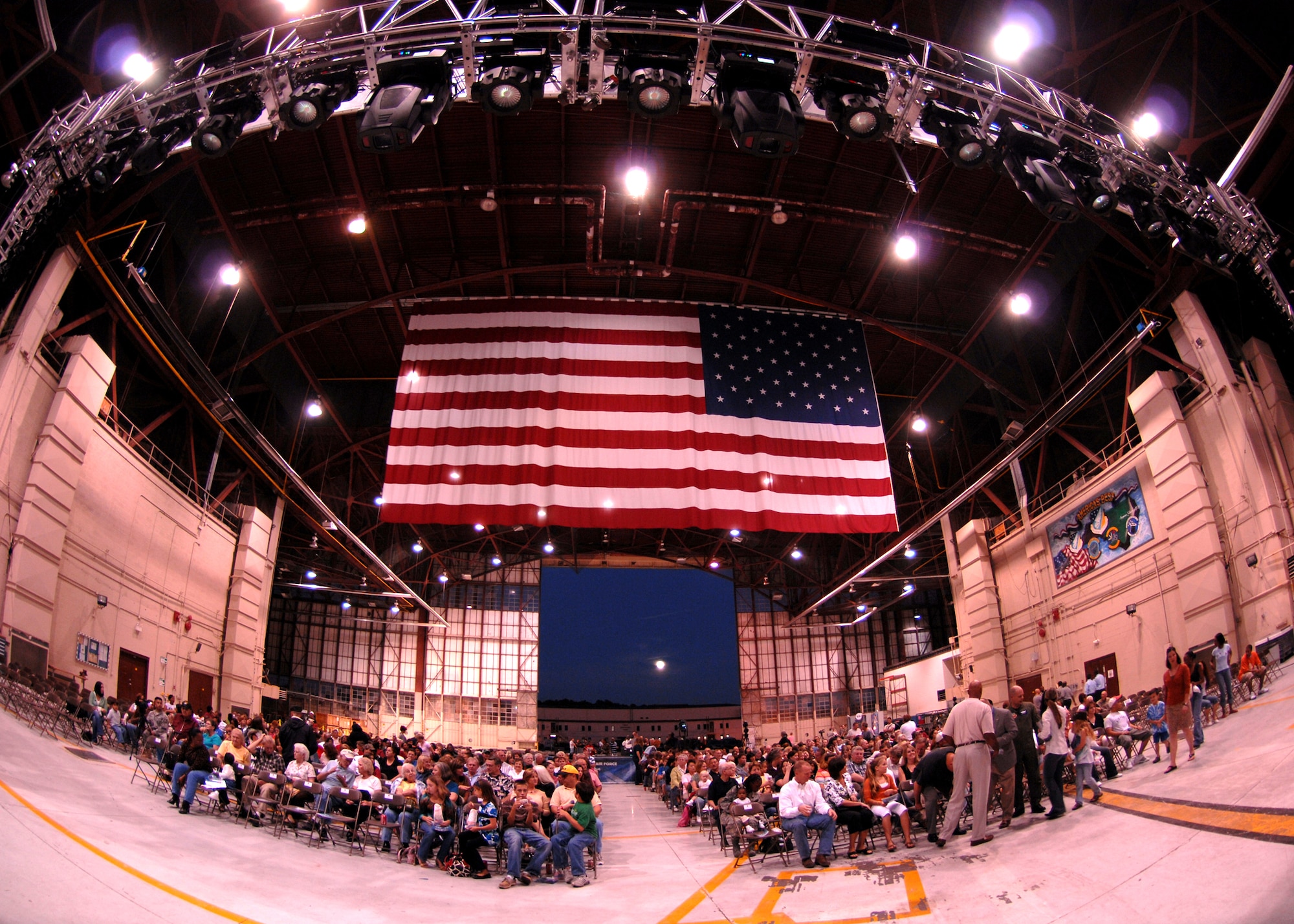 Many people gather in the 916th Air Refueling Wing Hanger, here on Seymour Johnson Air Force Base, N.C., to watch and this year’s Tops in Blue performance October 14, 2008. Tops in Blue is comprised of 35 performers that travel to Air Force Bases worldwide increasing troop morale. (U.S. Air Force Photo by Airman 1st Class Rae A. Perry)